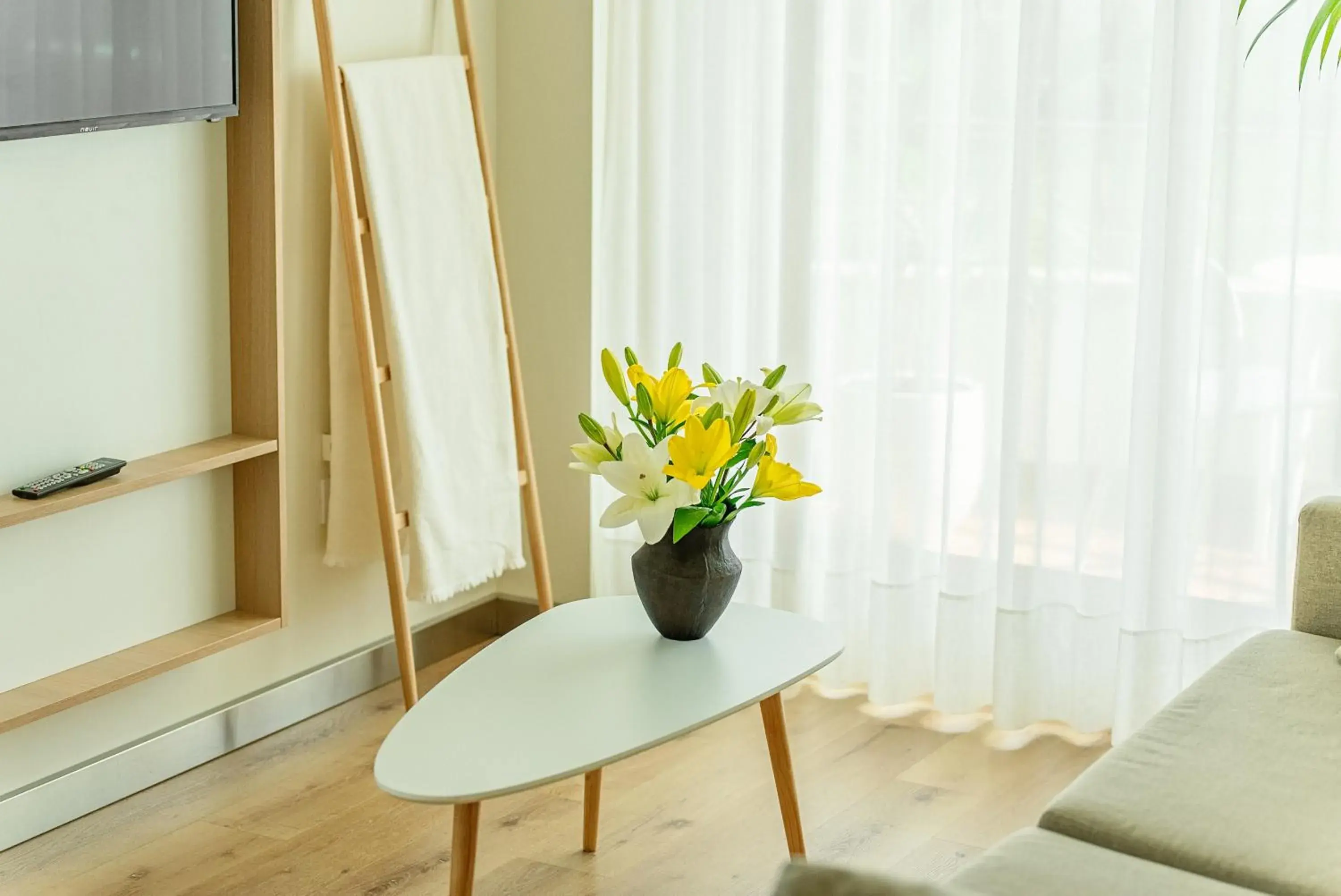 Living room in Playas de Liencres - Hotel & Apartamentos Living room in Playas de Liencres - Hotel & Apartamentos