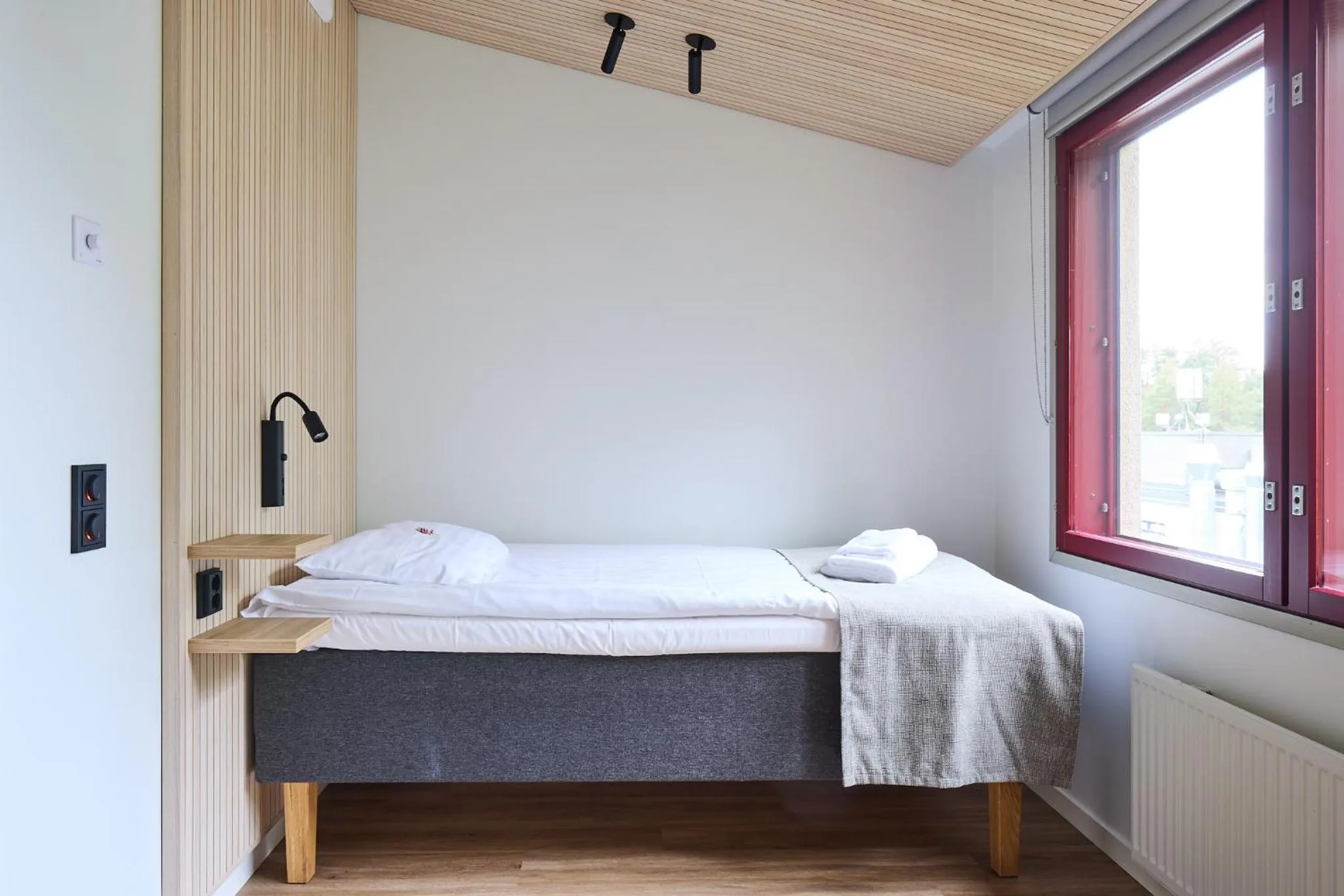 Bed in Hotel Linnasmäki