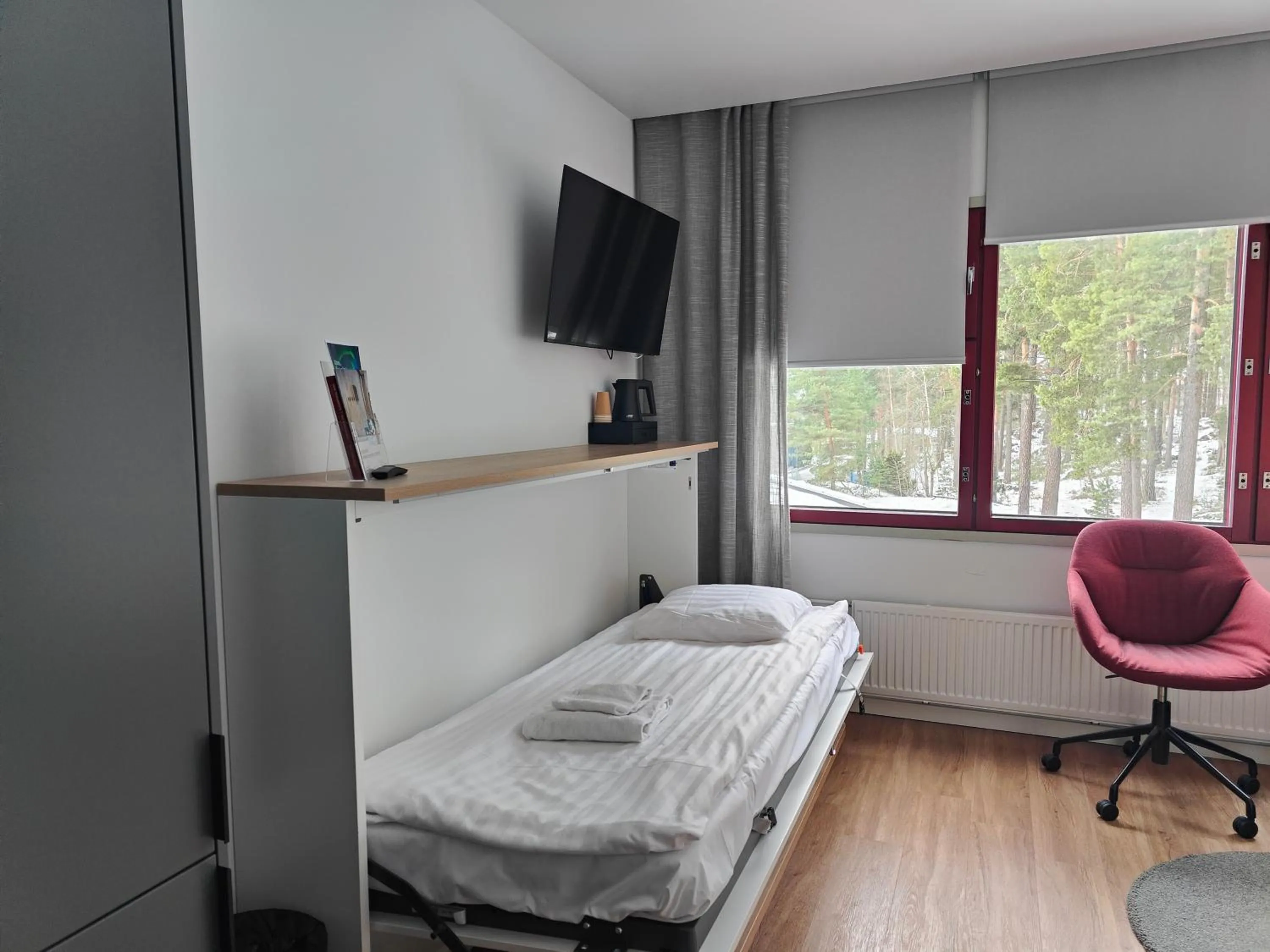 Bed in Hotel Linnasmäki