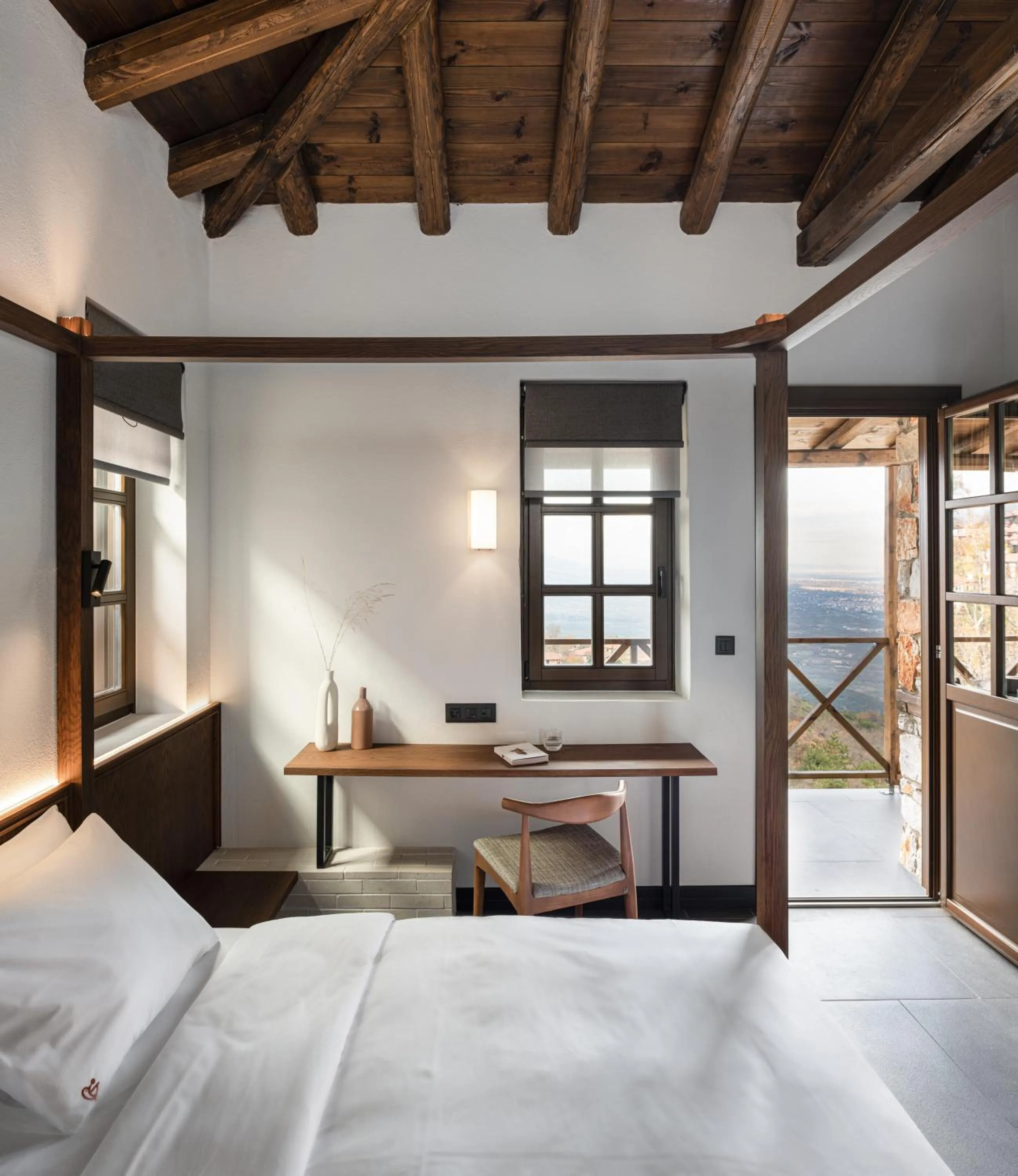 Balcony/Terrace, Bed in Unedo All Seasons Boutique Hotel