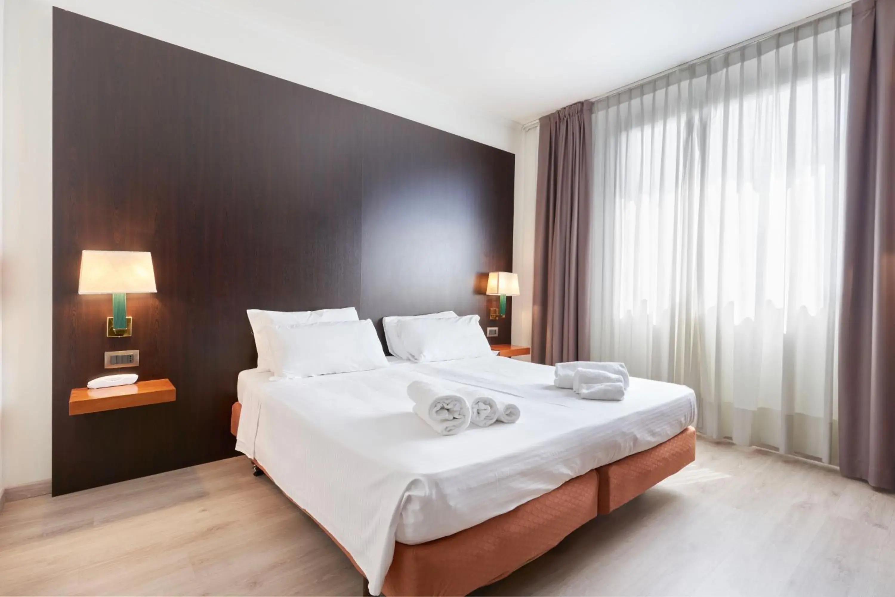 Bed in Hotel Cyrano Bed in Hotel Cyrano