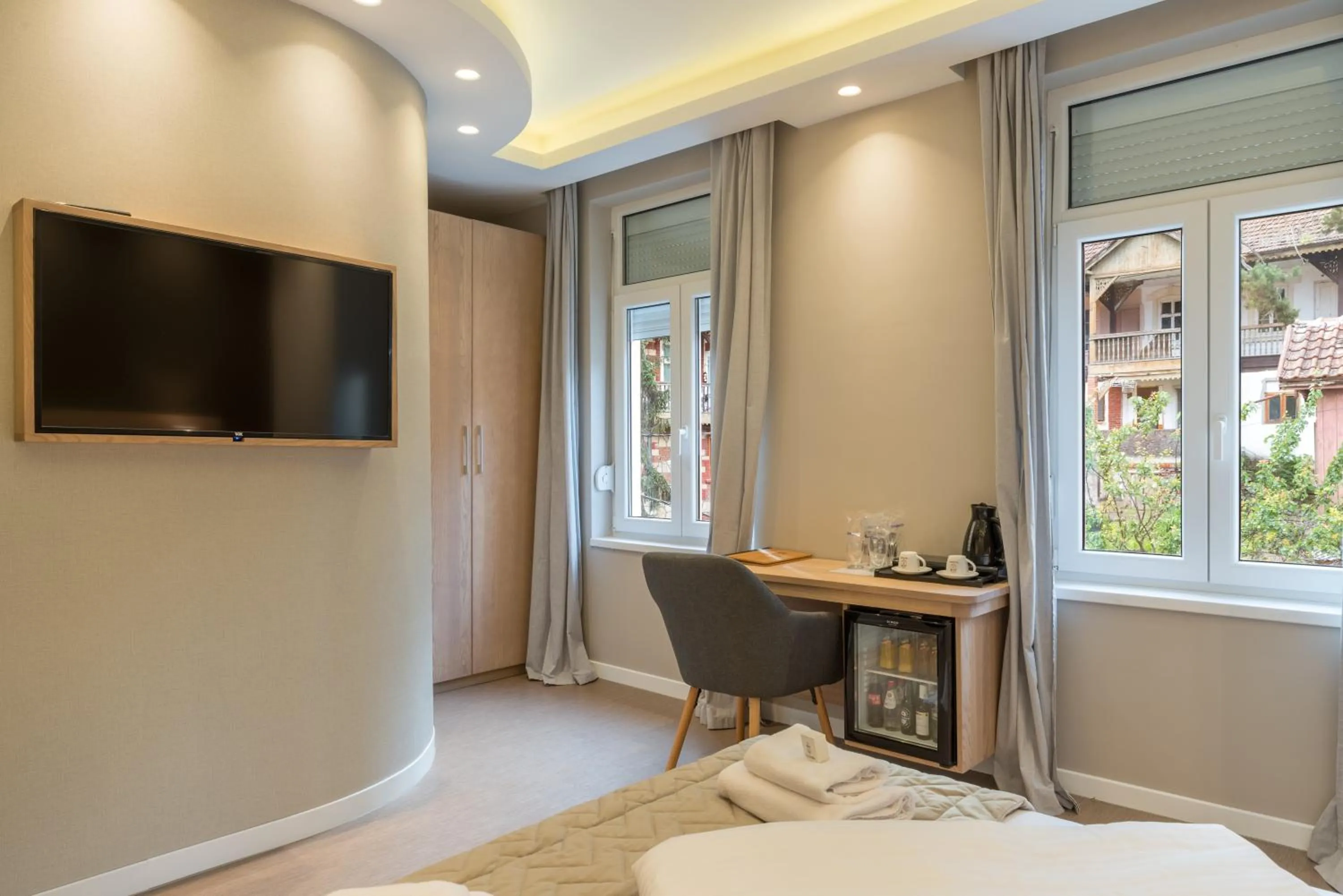 Bed in Emilia Lux Rooms