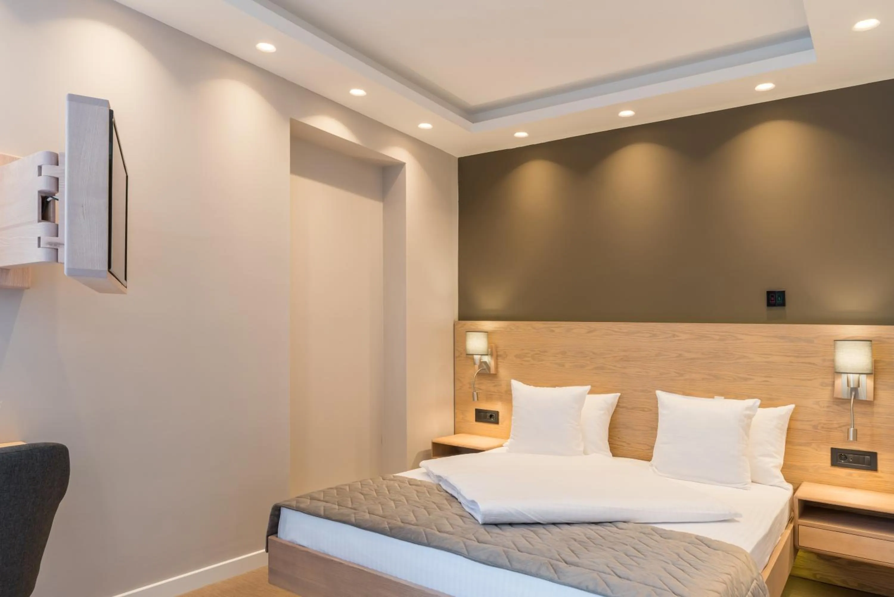 Bed in Emilia Lux Rooms