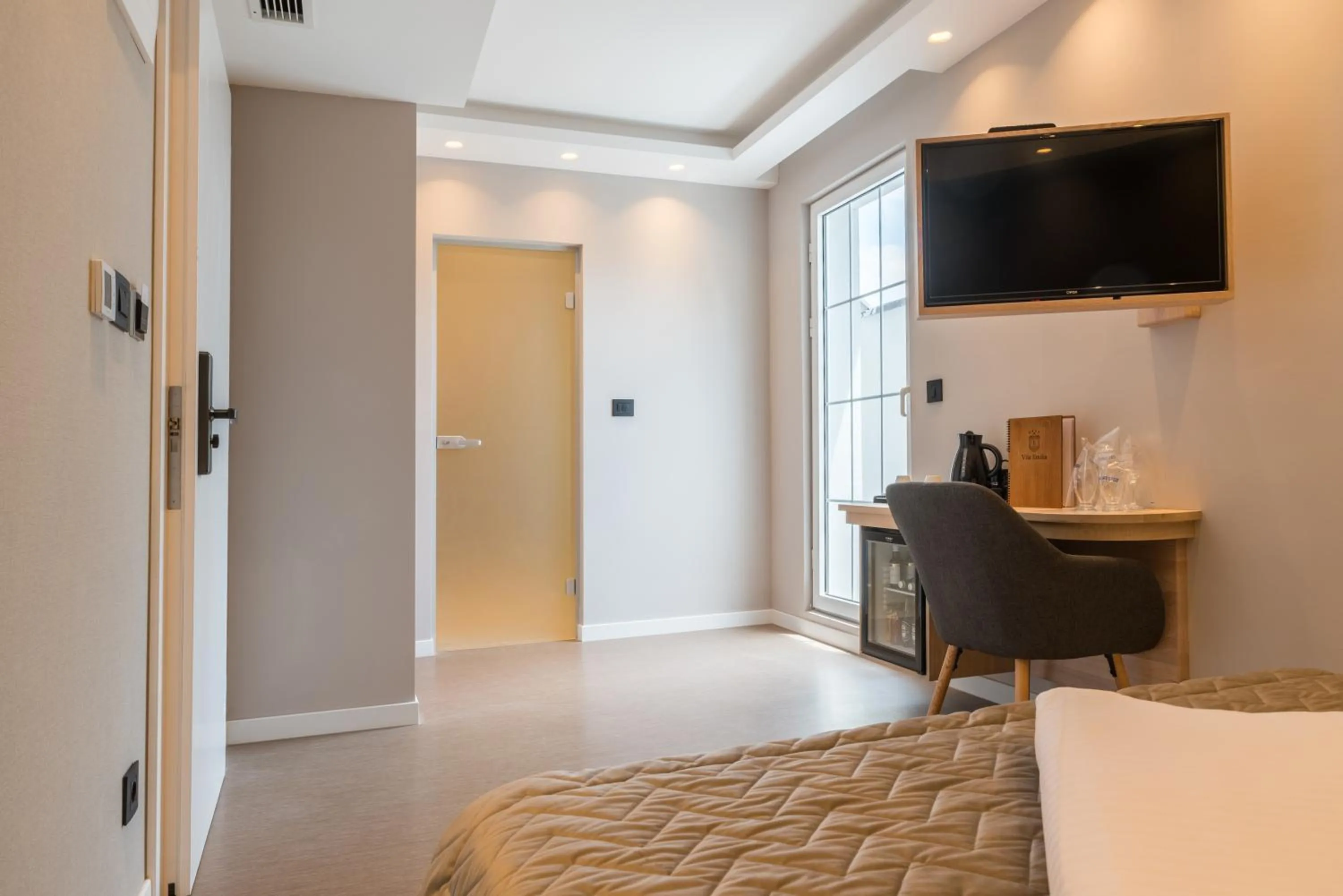 Bed in Emilia Lux Rooms