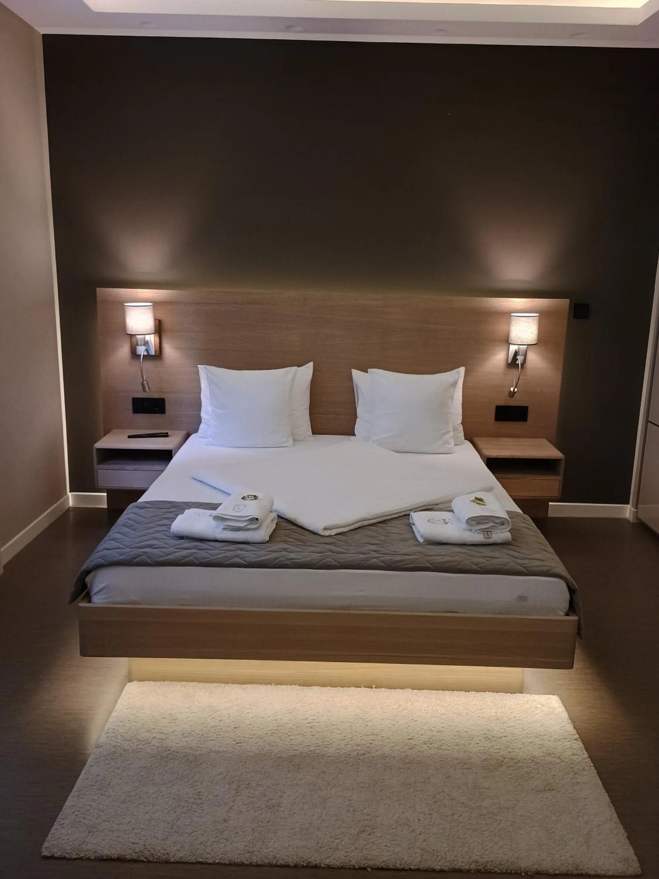 Bed in Emilia Lux Rooms