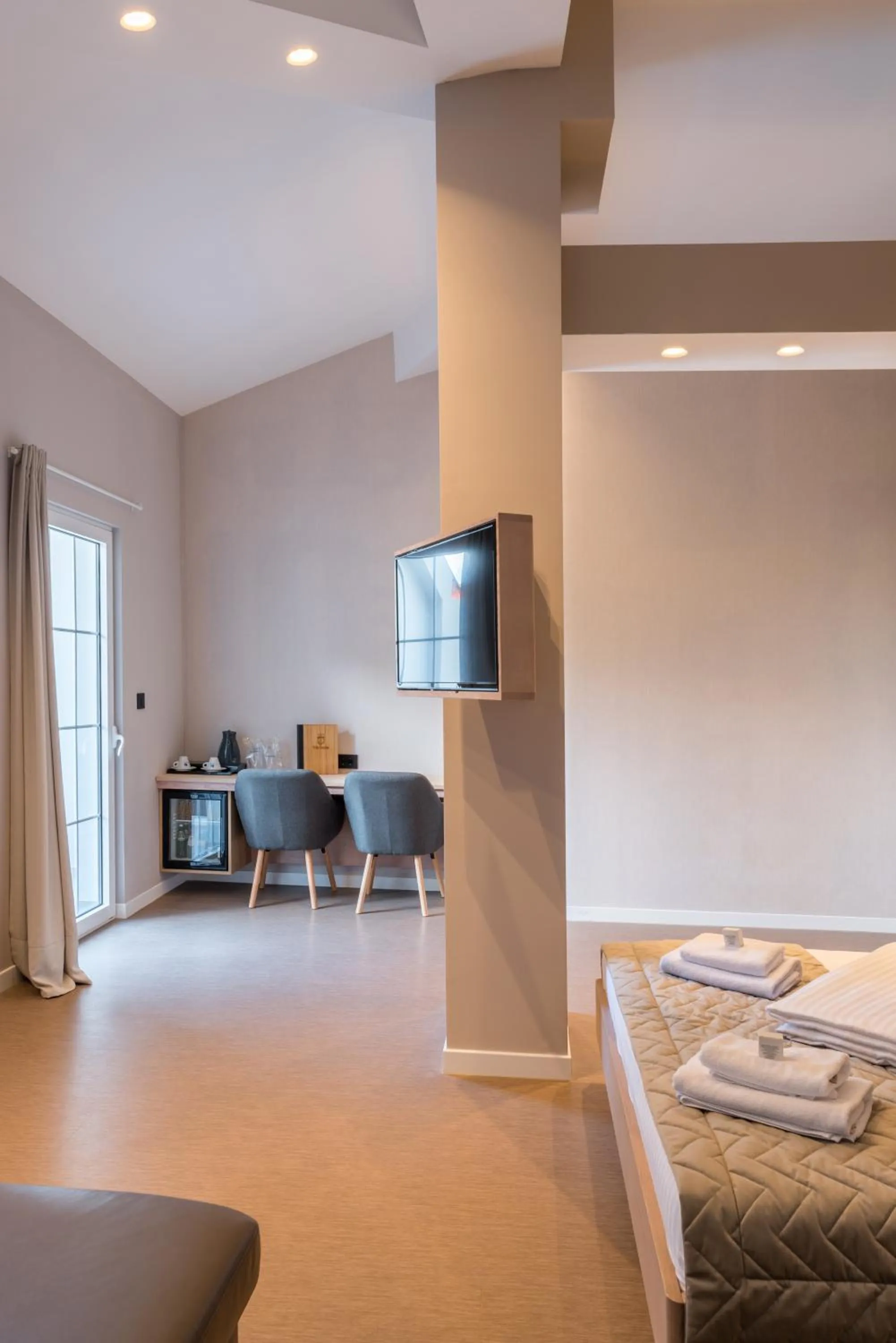 Bed in Emilia Lux Rooms