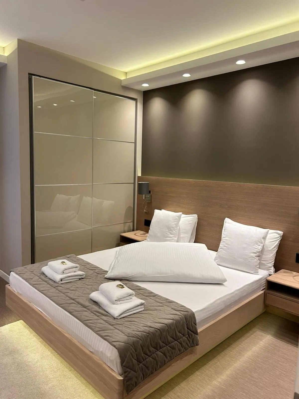 Bed in Emilia Lux Rooms