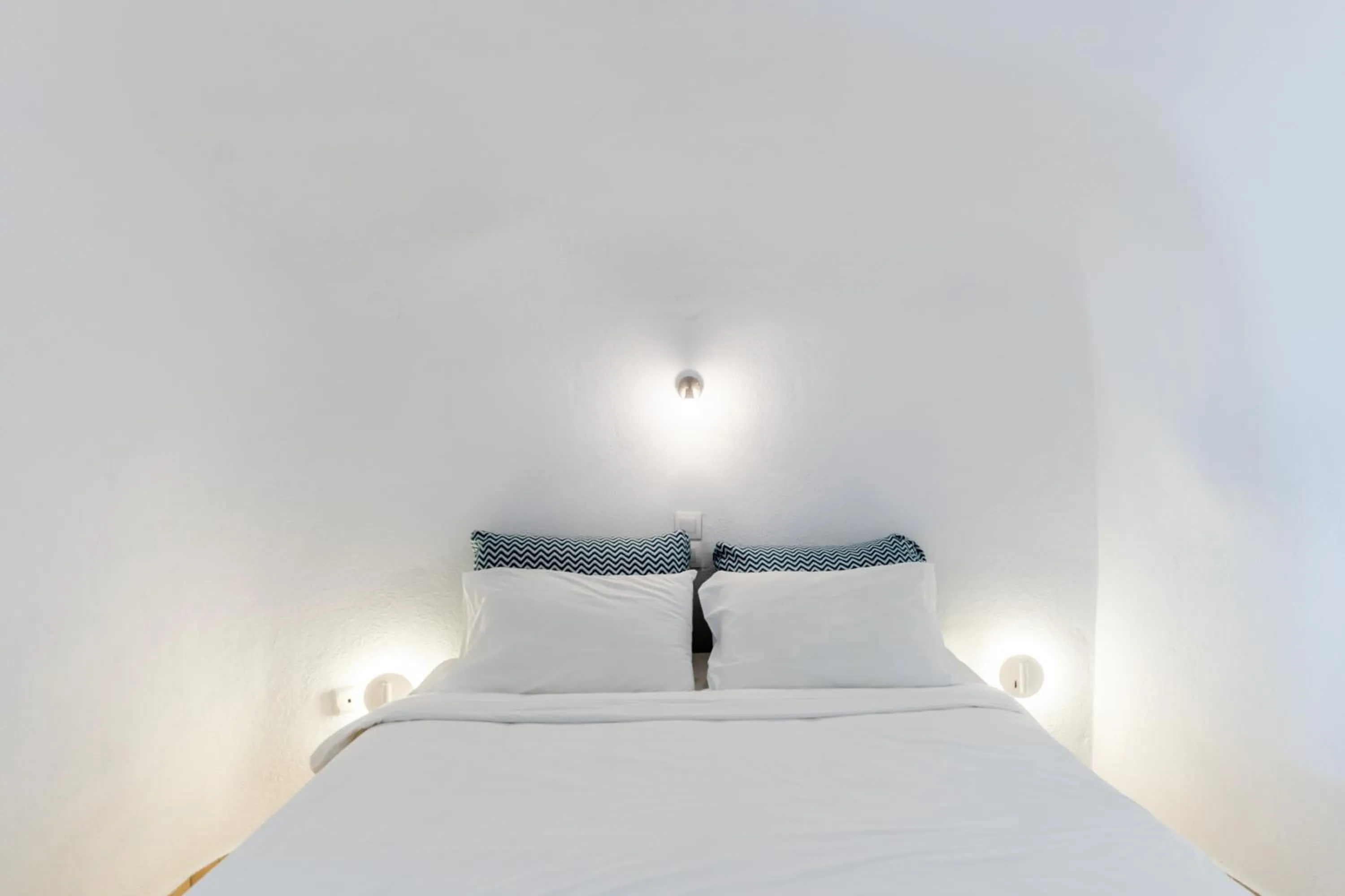 Bedroom in Vogue Suites