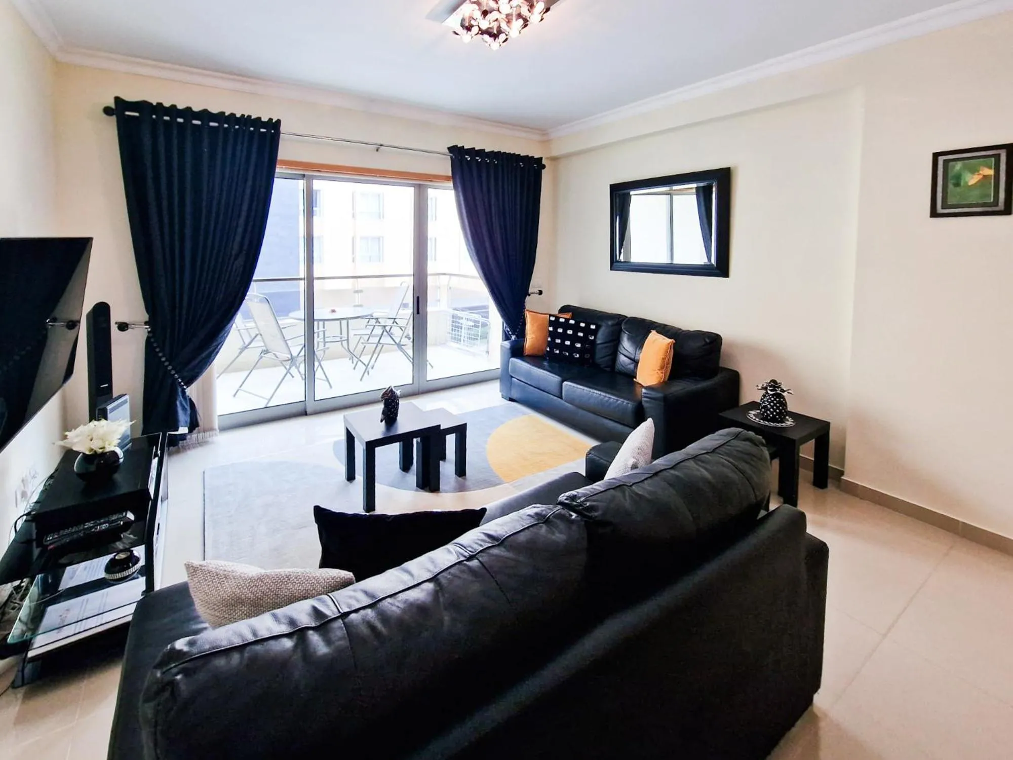 Communal lounge/ TV room in Apartment Rocha Oceano Azul Charming