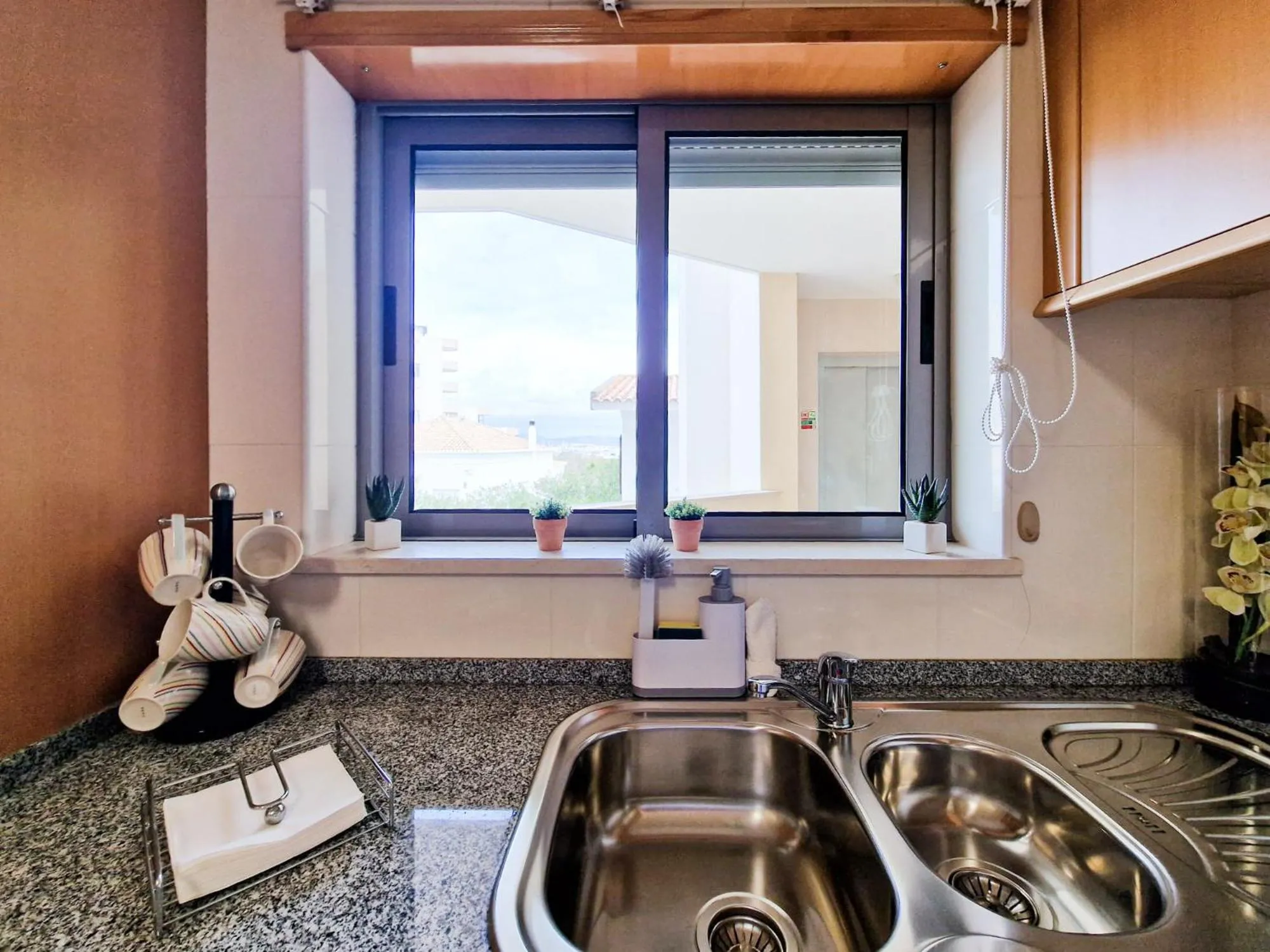 Kitchen or kitchenette in Apartment Rocha Oceano Azul Charming