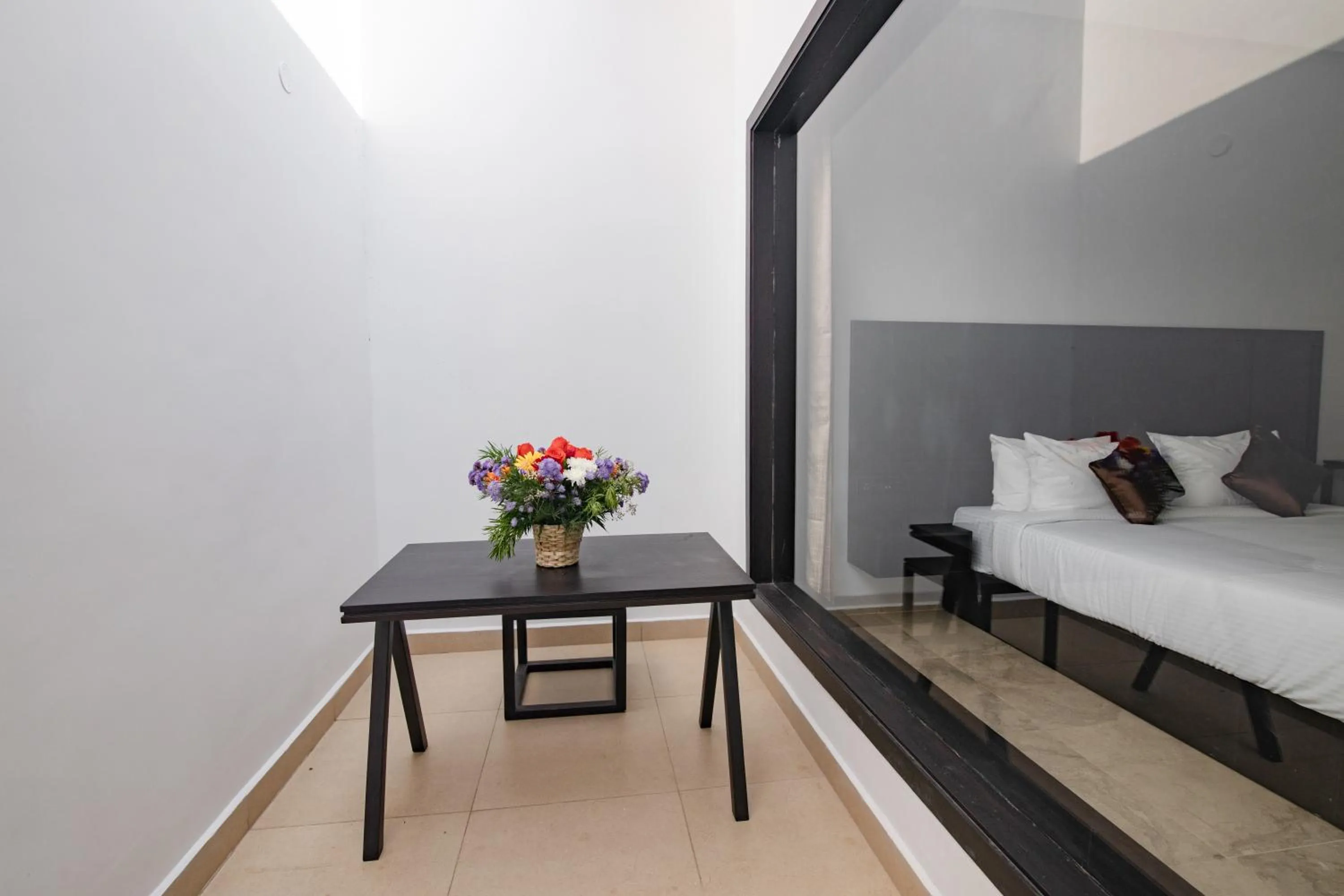 Seating area, Bed in The Saravi Resort