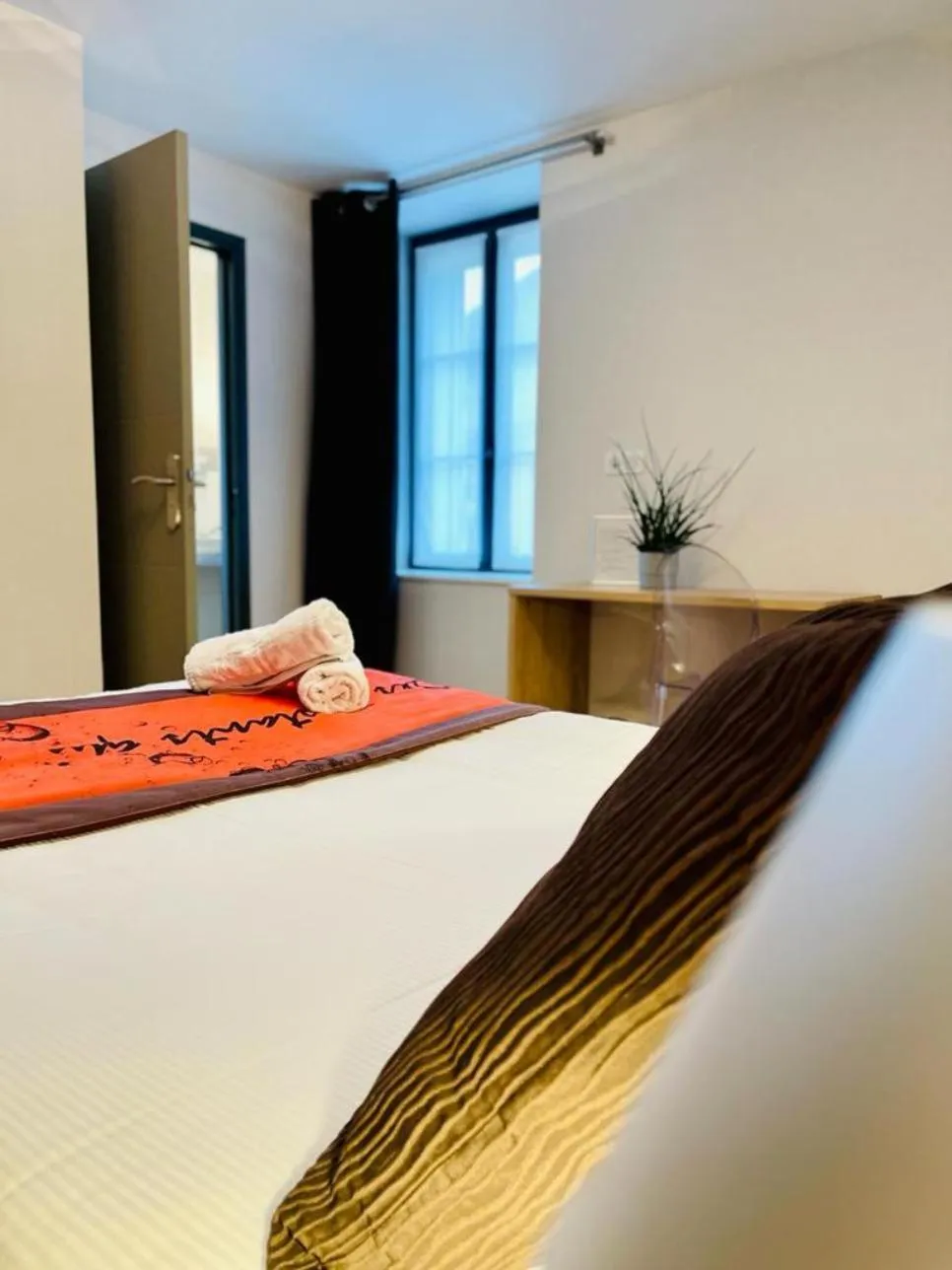 Bedroom in Au Coeur Des Bulles