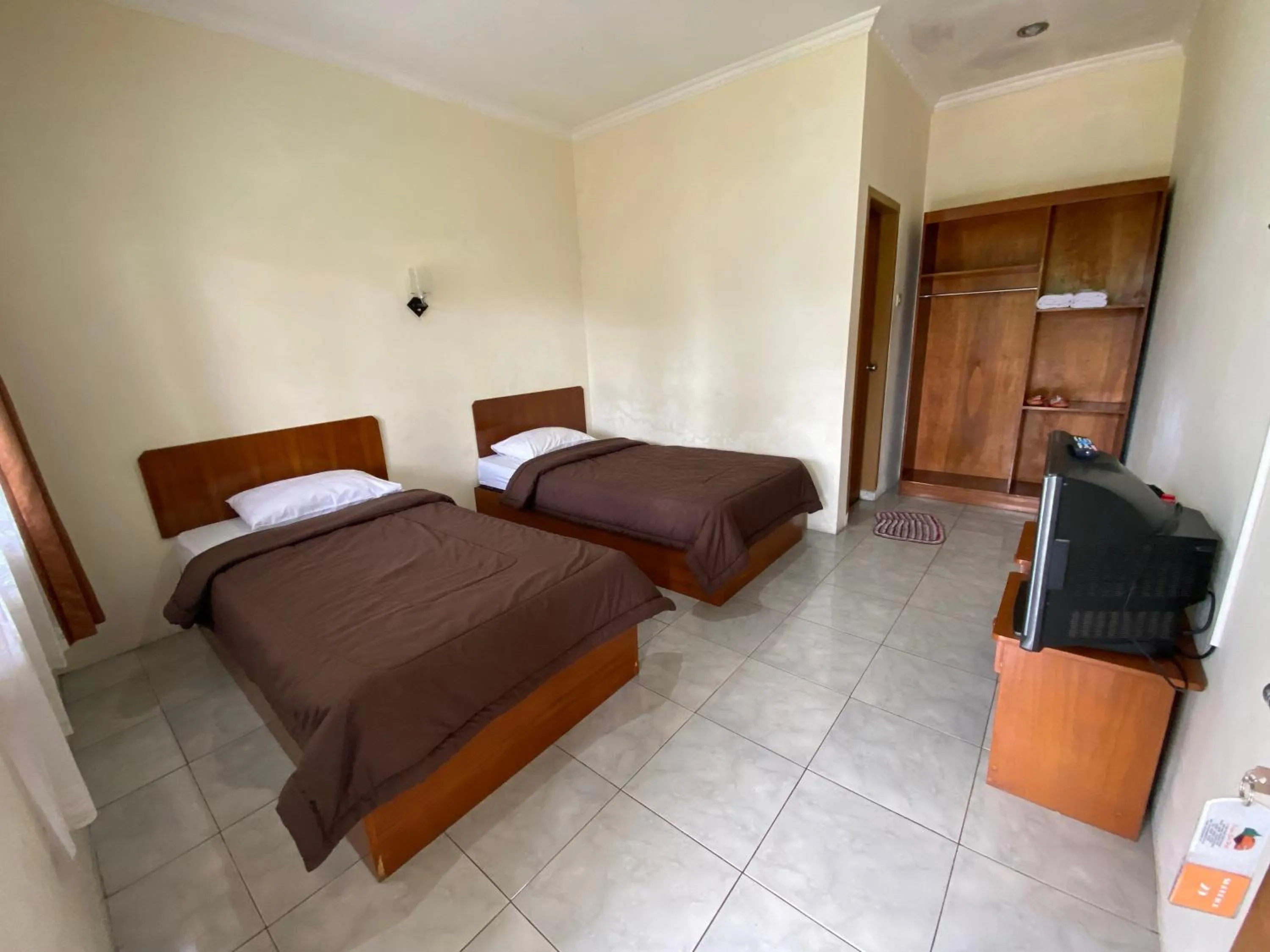 Bed in Hotel Puspa Sari