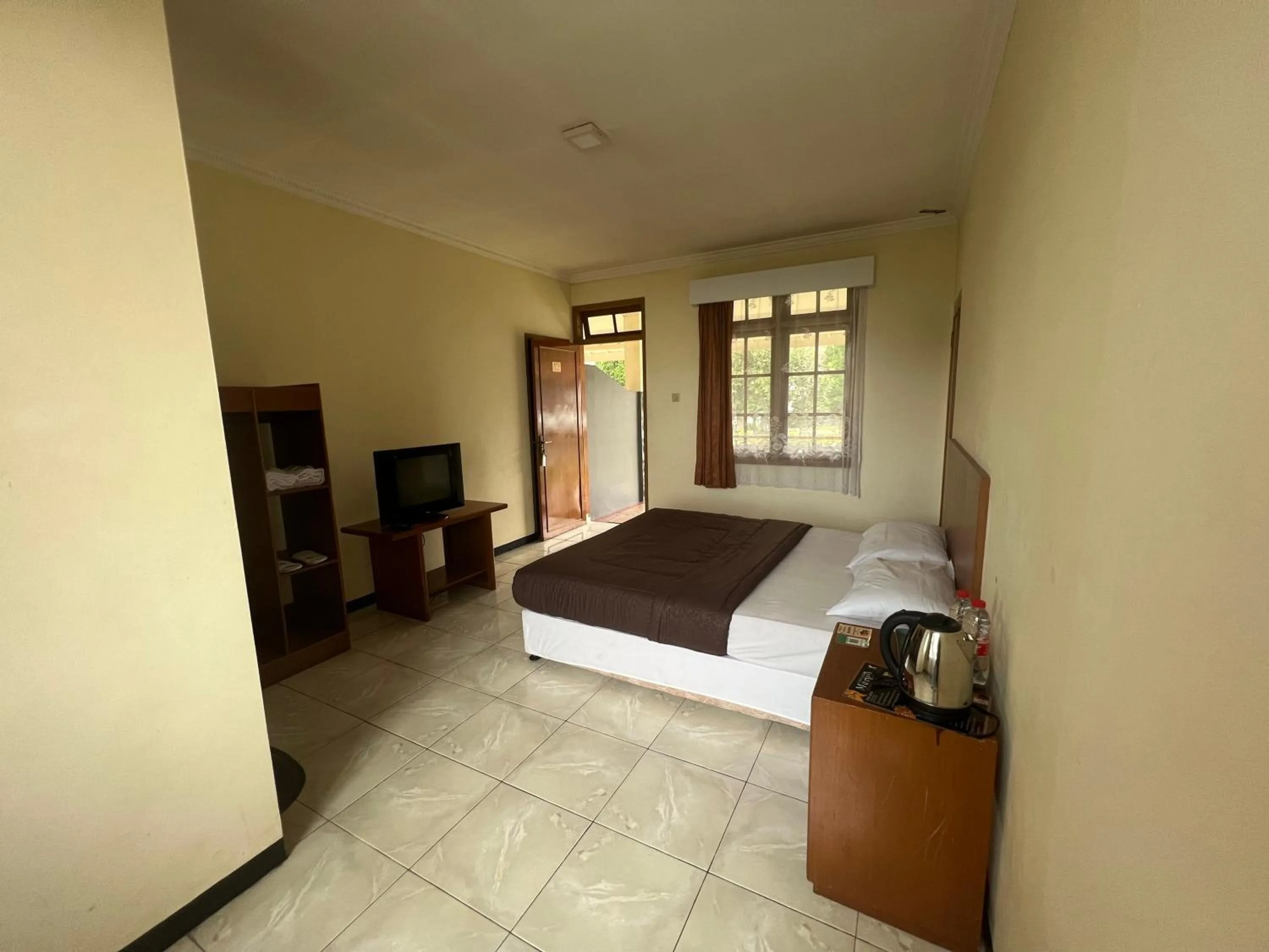 Bed in Hotel Puspa Sari