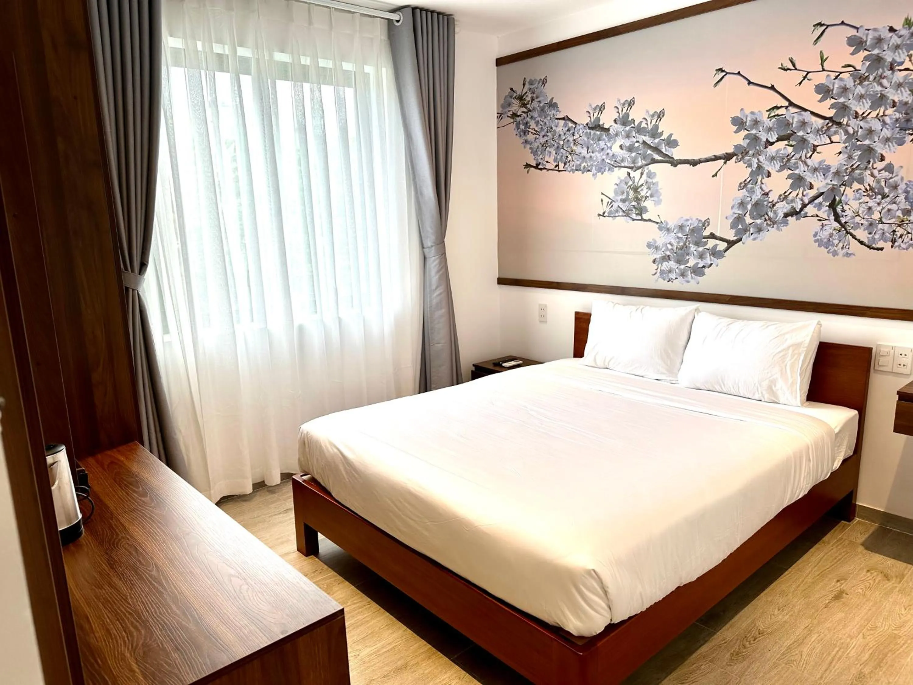 Bed in The Present River Villa Hoi An