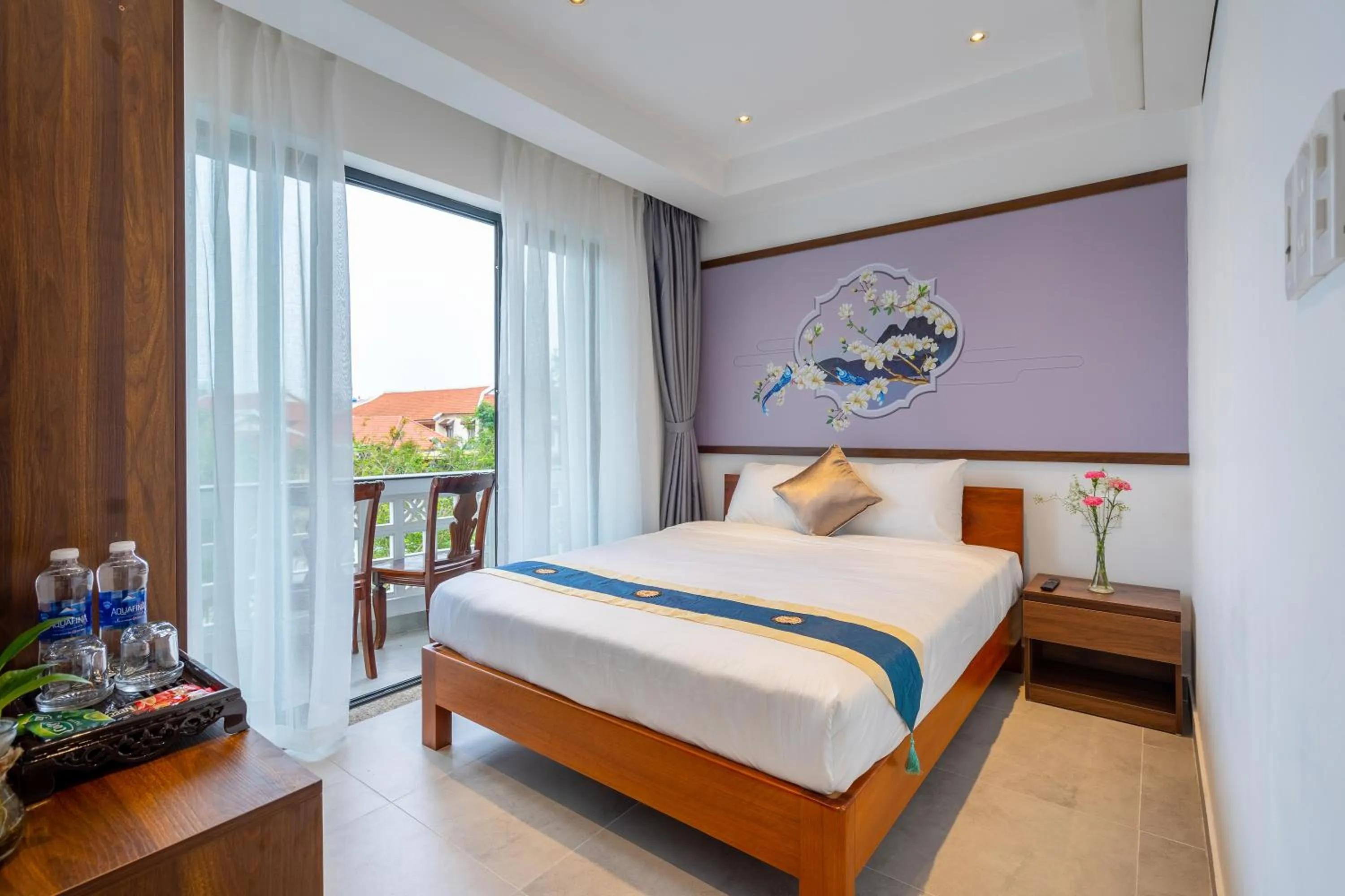 Bed in The Present River Villa Hoi An