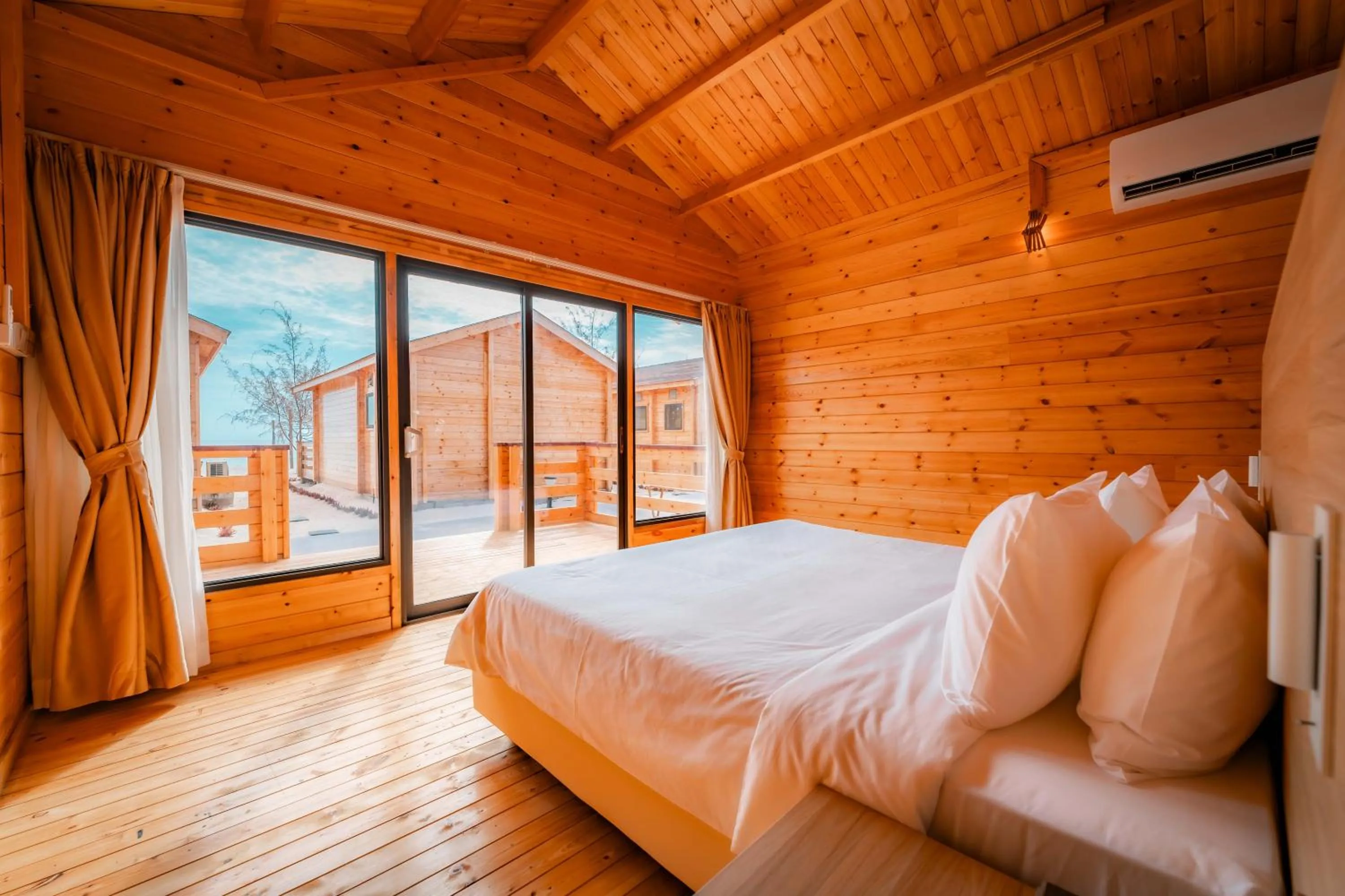 Photo of the whole room, Bed in JSK Mantanani Island Resorts