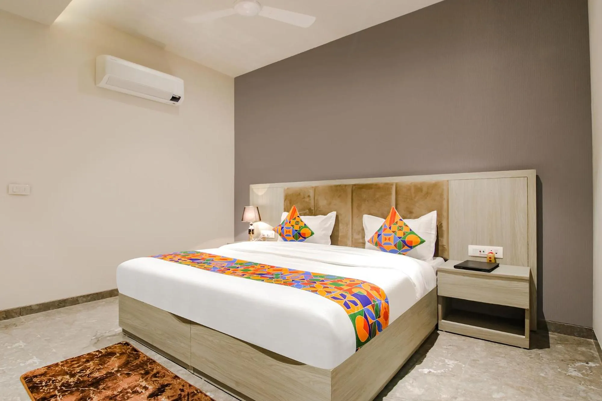 Bed in FabHotel Prime K9 Grand