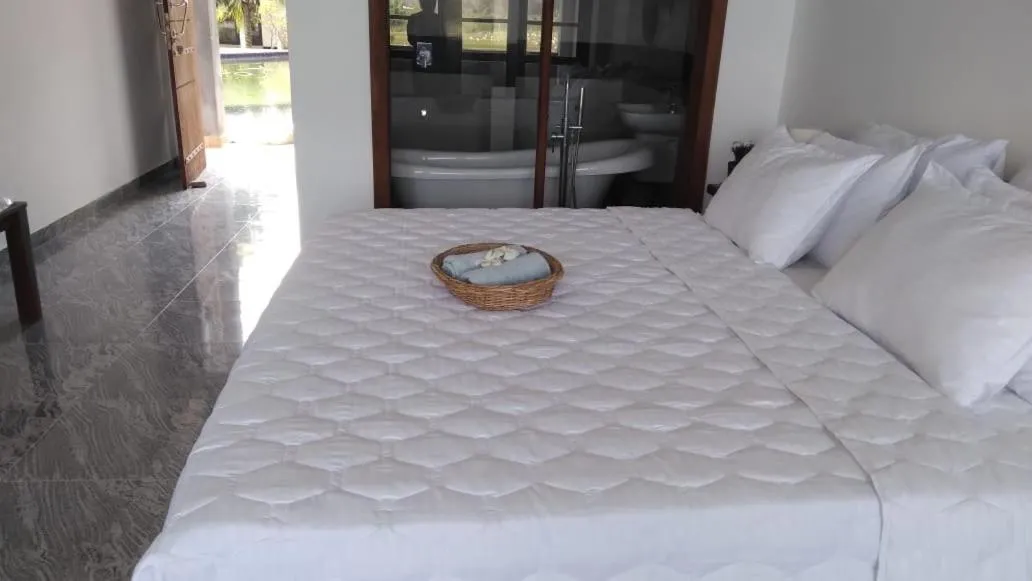 Bed in WILD FORTRESS HOTEL Sigiriya
