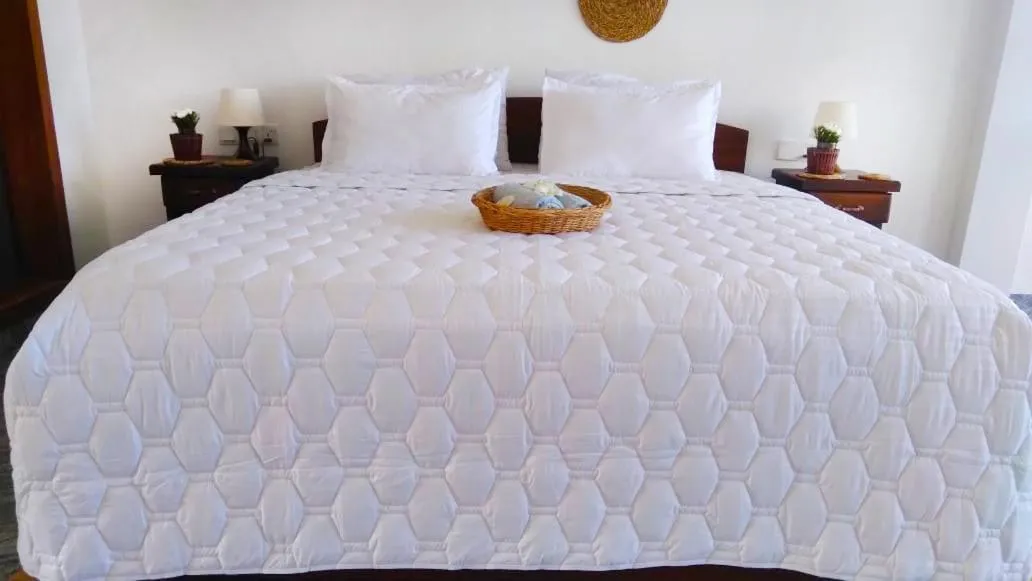 Bed in WILD FORTRESS HOTEL Sigiriya