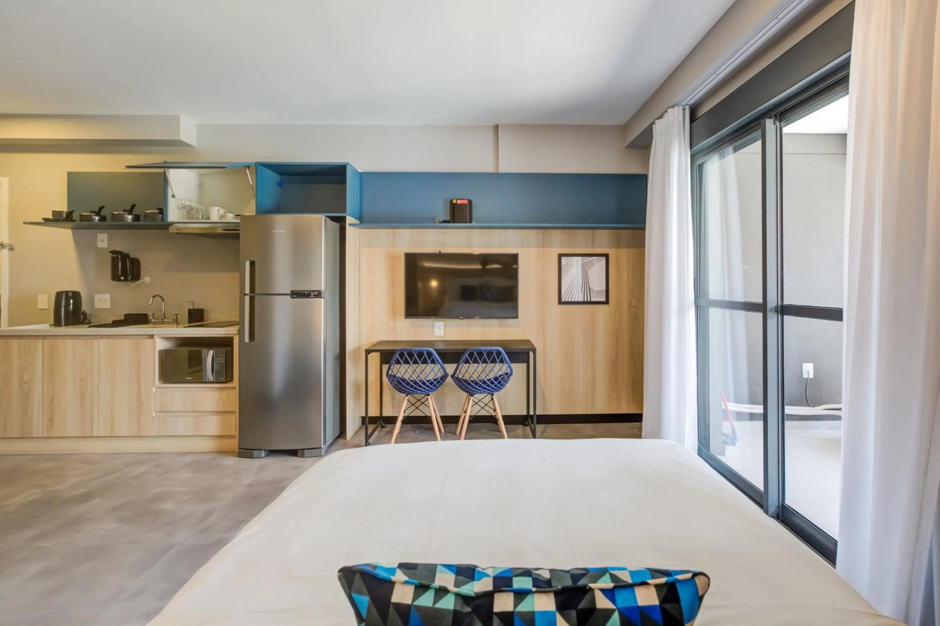 Bed in Roomo Brooklin Morumbi Residencial