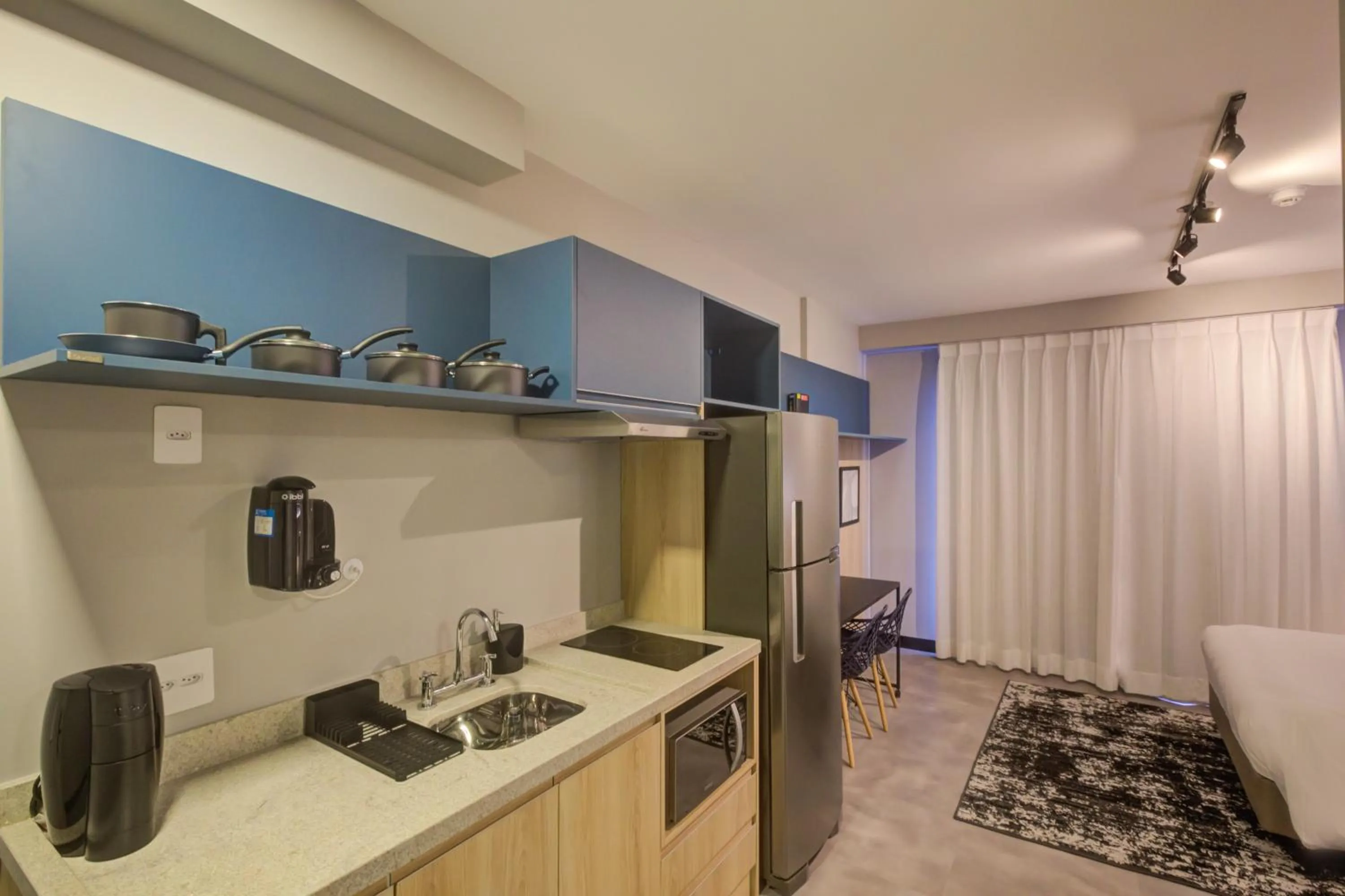 kitchen in Roomo Brooklin Morumbi Residencial