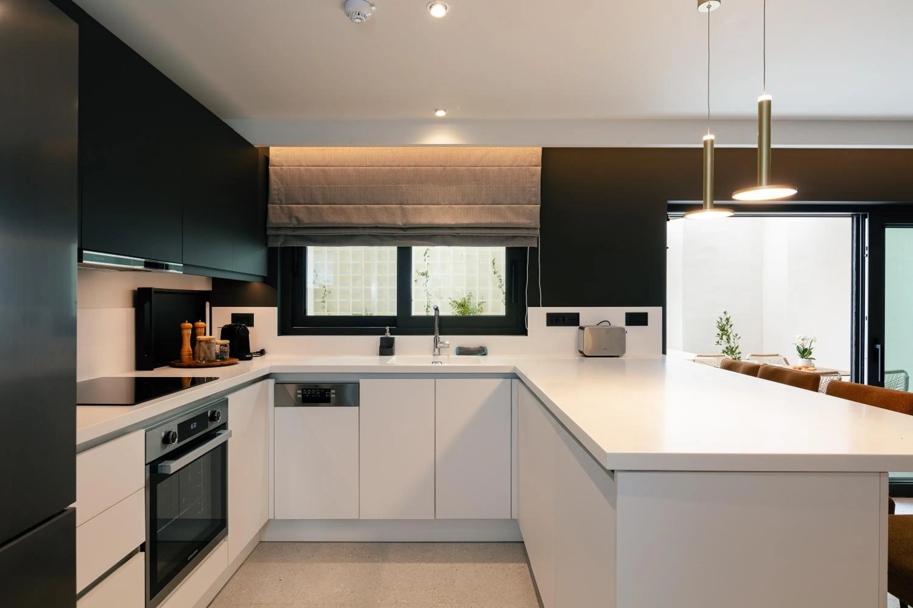 Kitchen or kitchenette in Porta Suites