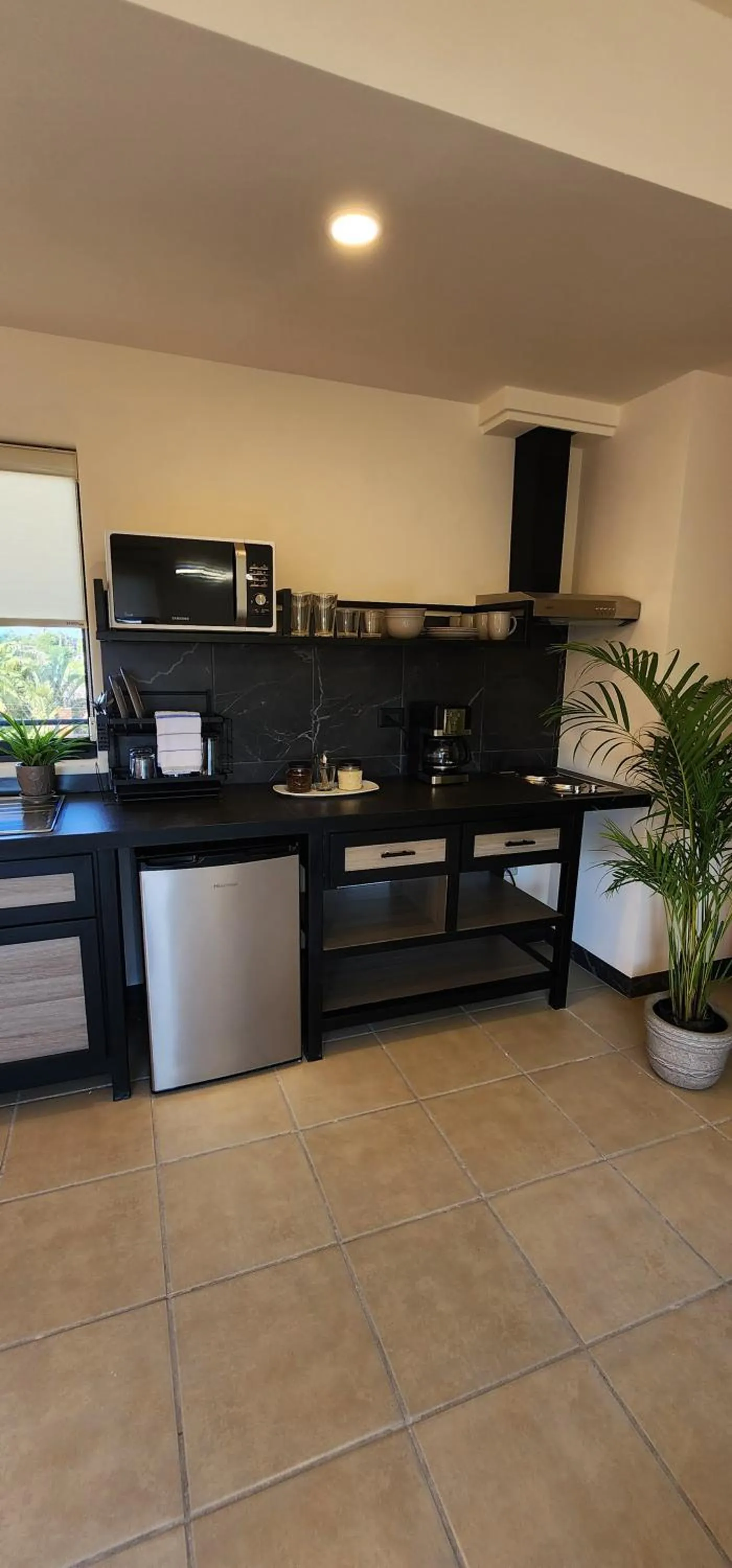 Kitchen or kitchenette in SUITES LOMBOY & PLAZA