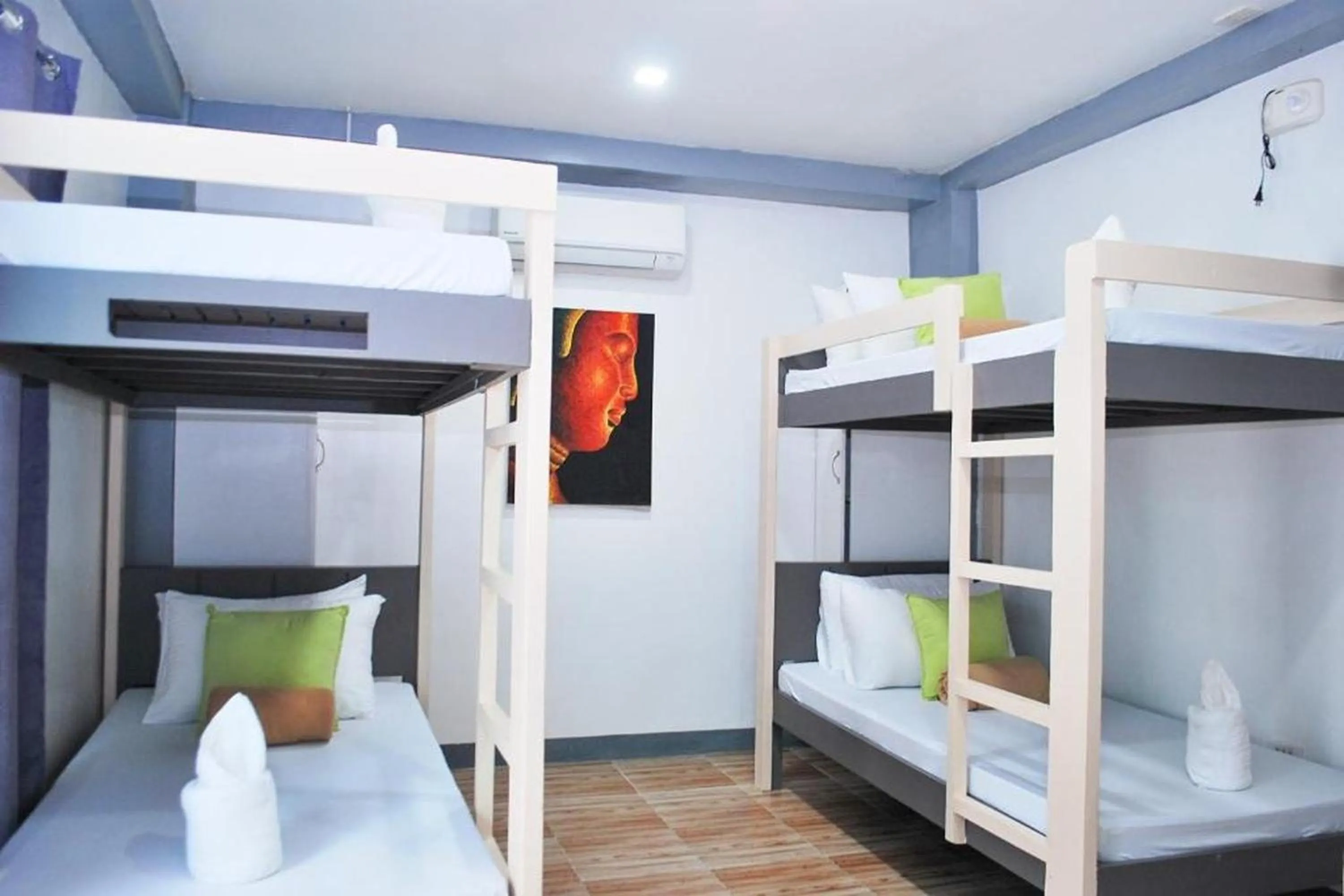 Photo of the whole room, Bed in Woza Inn Boracay