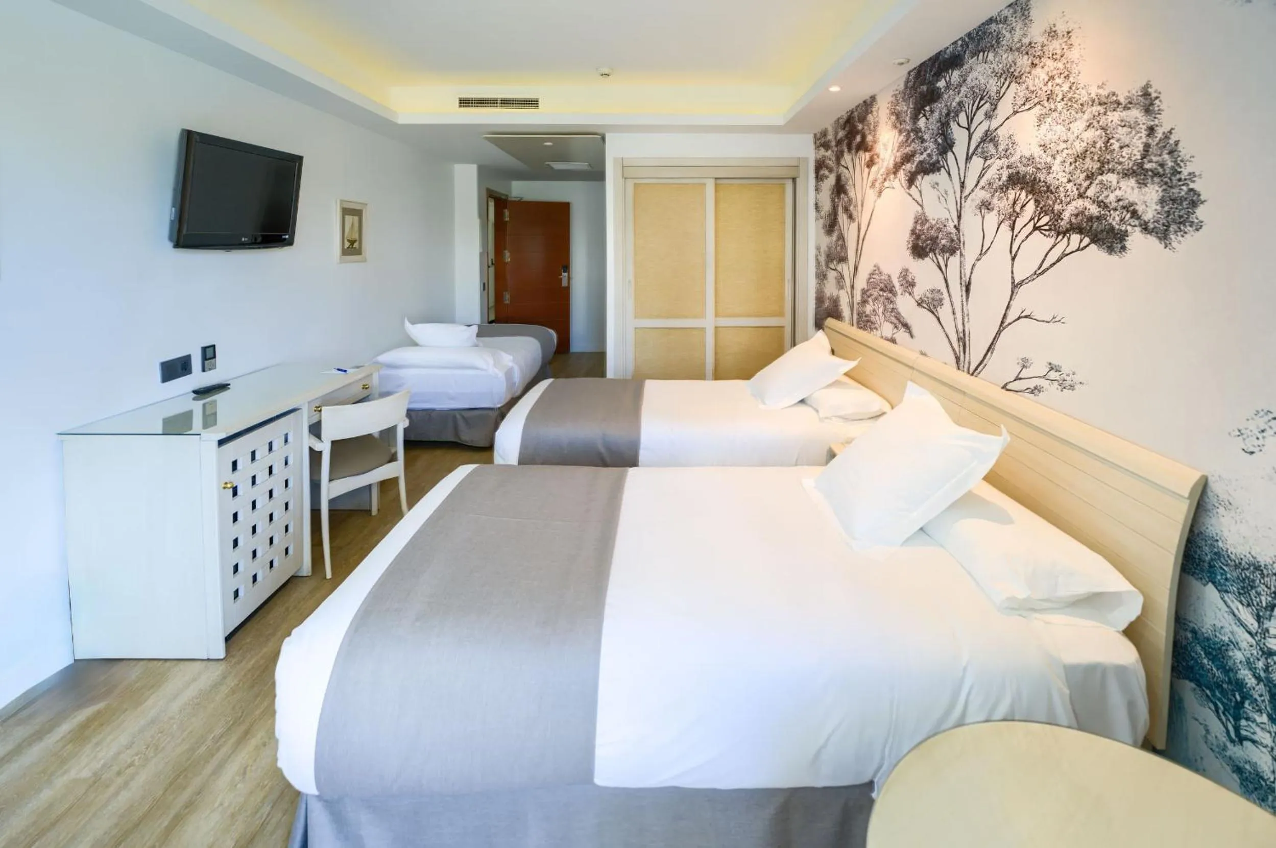 Bed in Hotel Puerto Bahía & Spa