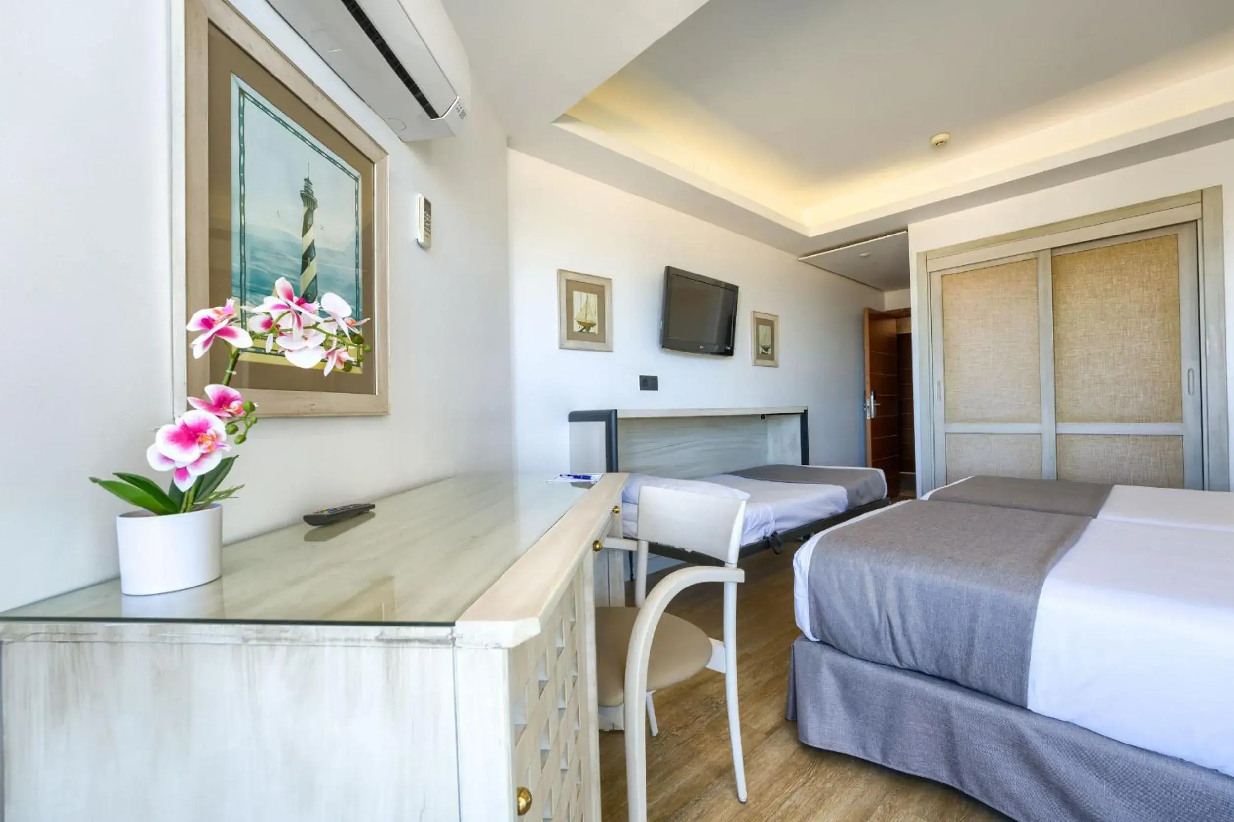 Twin Room with Sea View and Extra Bed in Hotel Puerto Bahía & Spa Twin Room with Sea View and Extra Bed in Hotel Puerto Bahía & Spa
