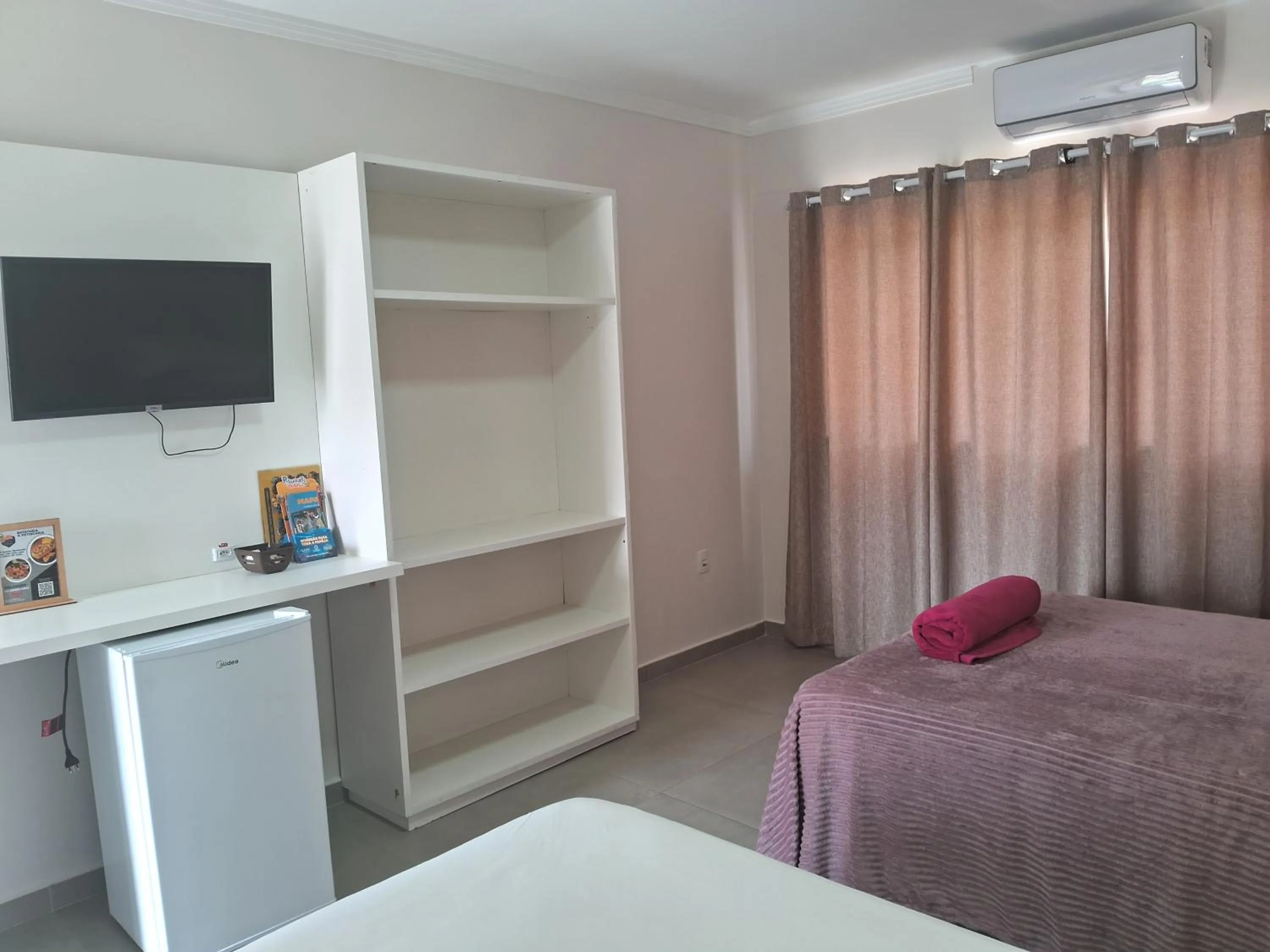 Bed in Pousada Castelo do Rei