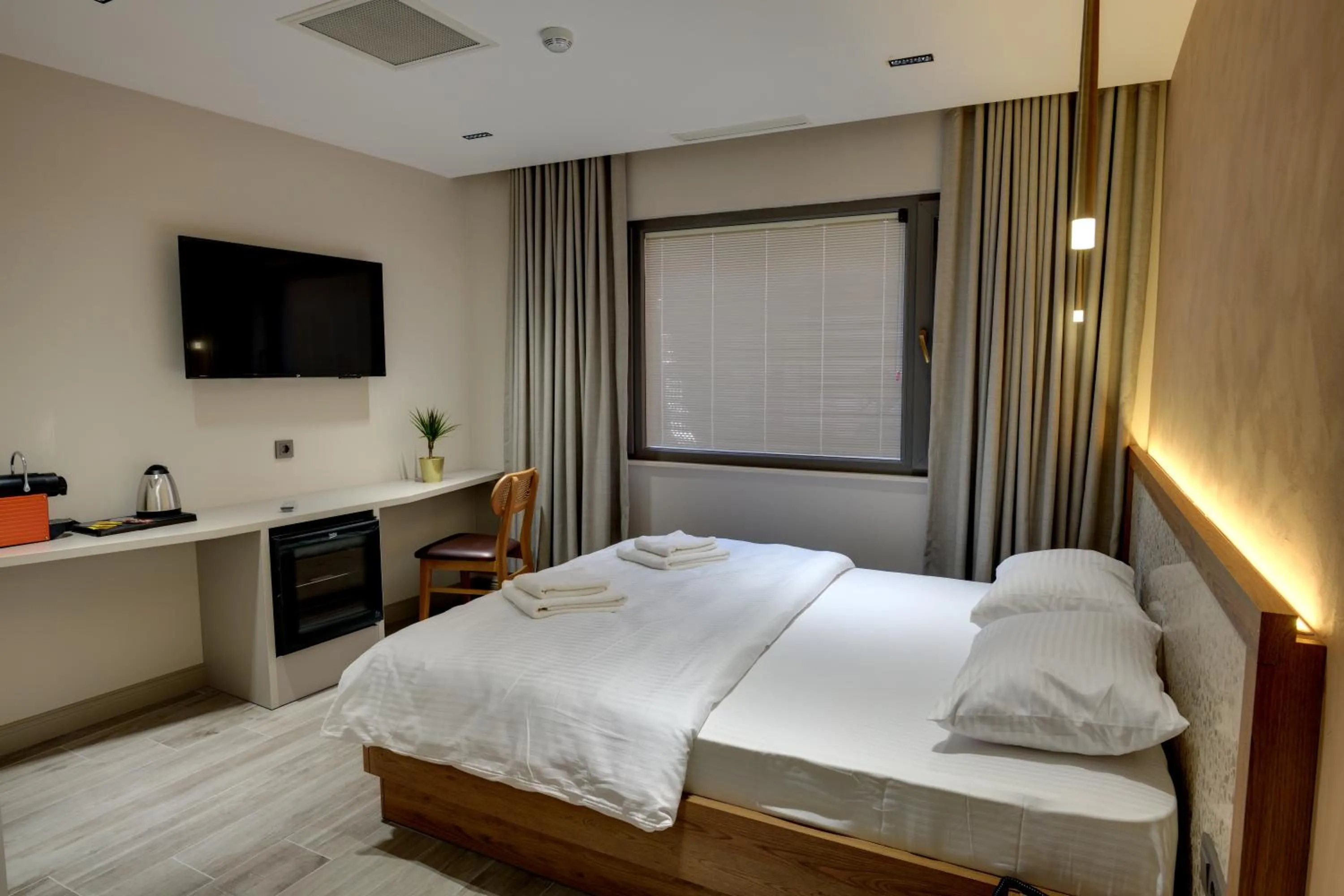 Bed in 21 Rooms Hotel