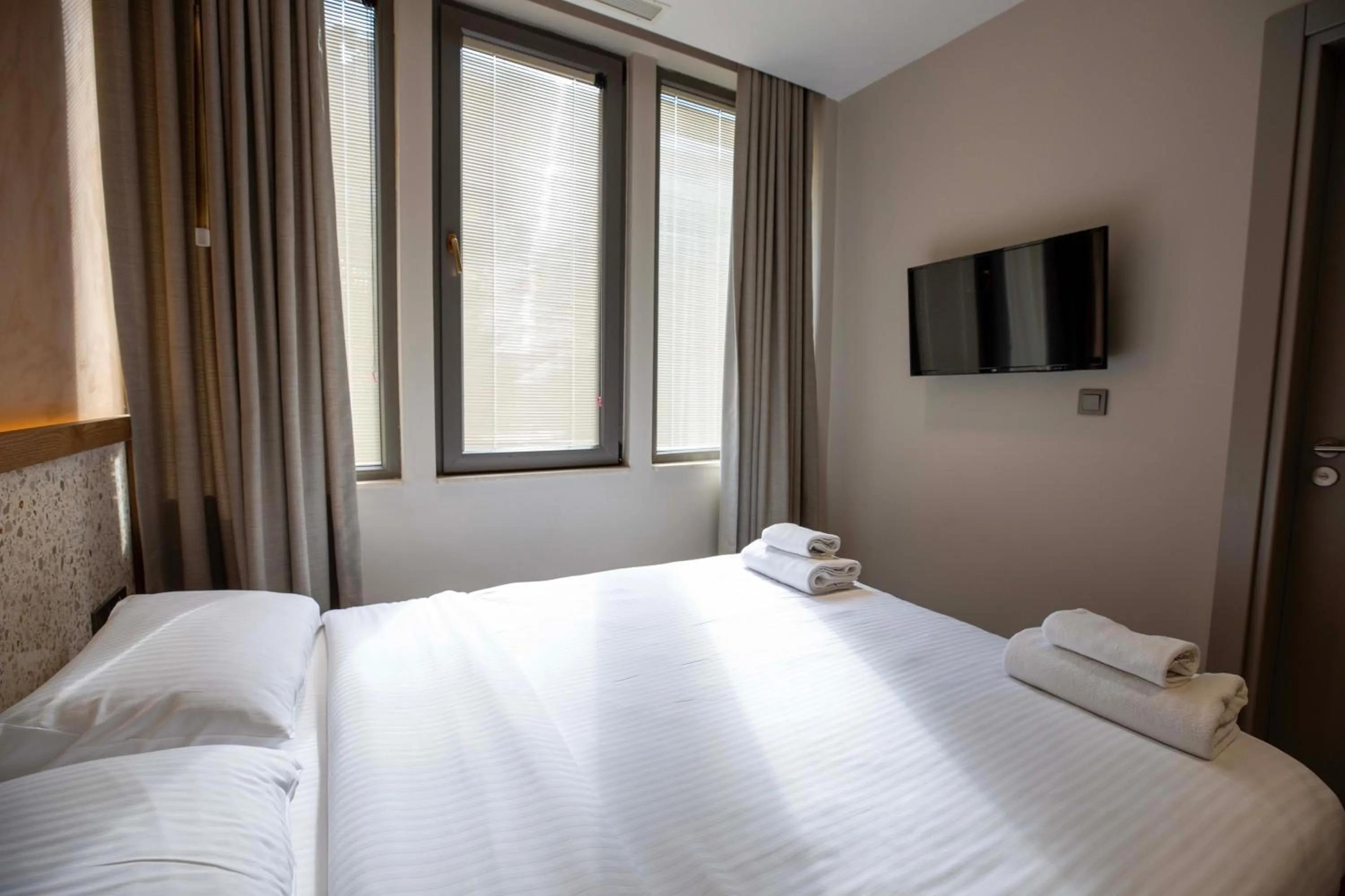 Bed in 21 Rooms Hotel