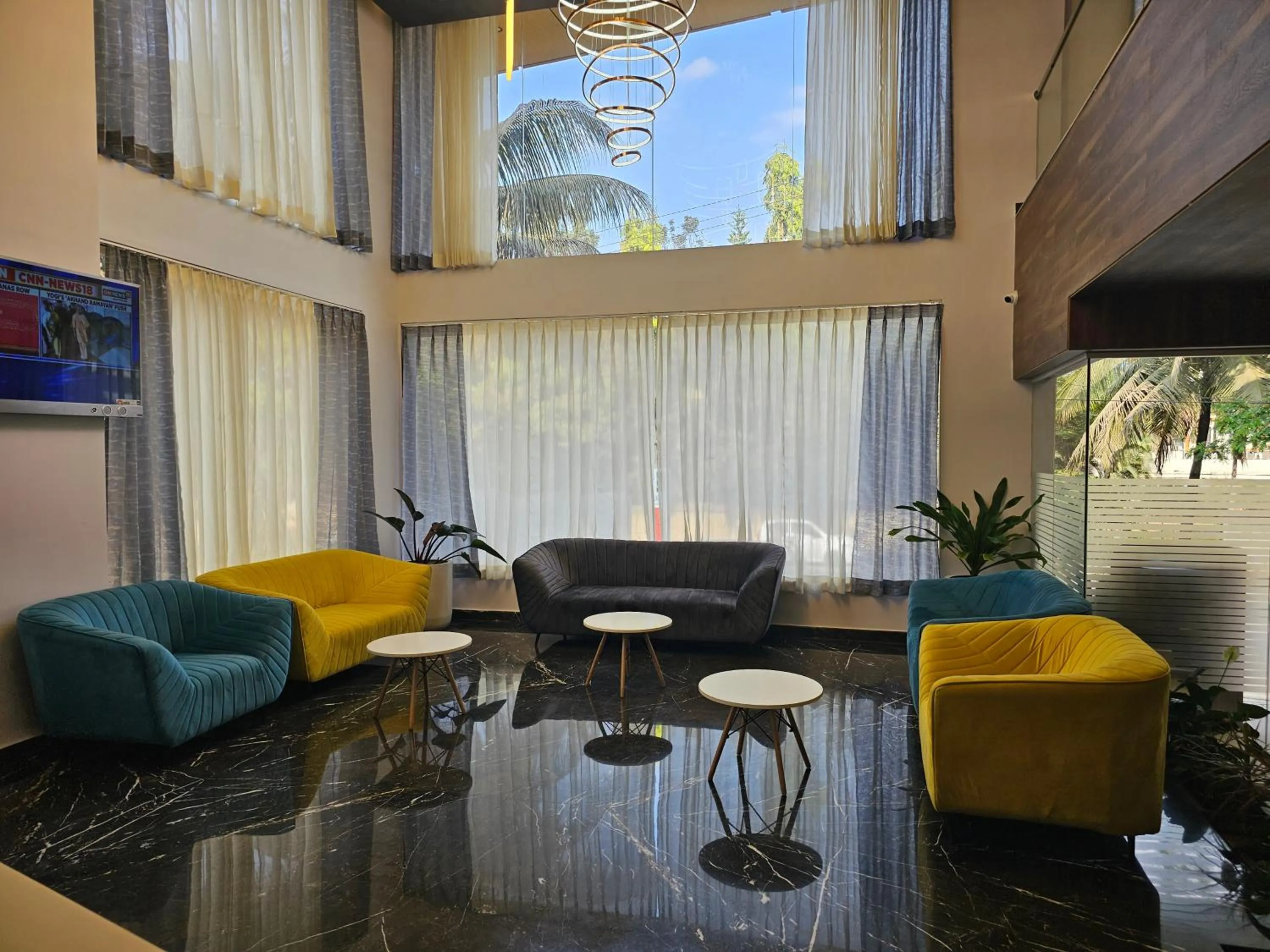 Communal lounge/ TV room in Quality Inn Rockwell Grand, Bangalore