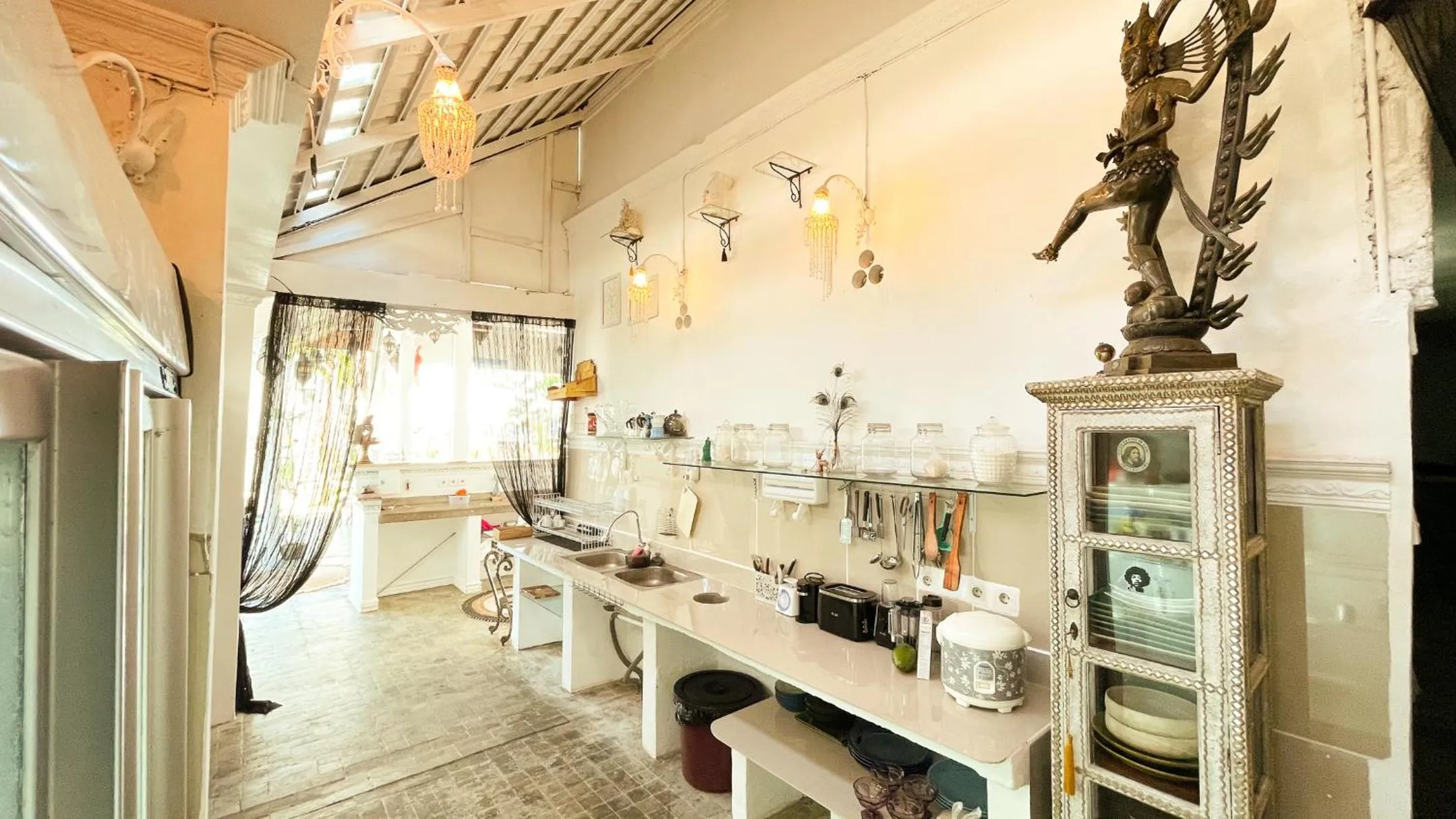 Kitchen or kitchenette in Surga Homestay