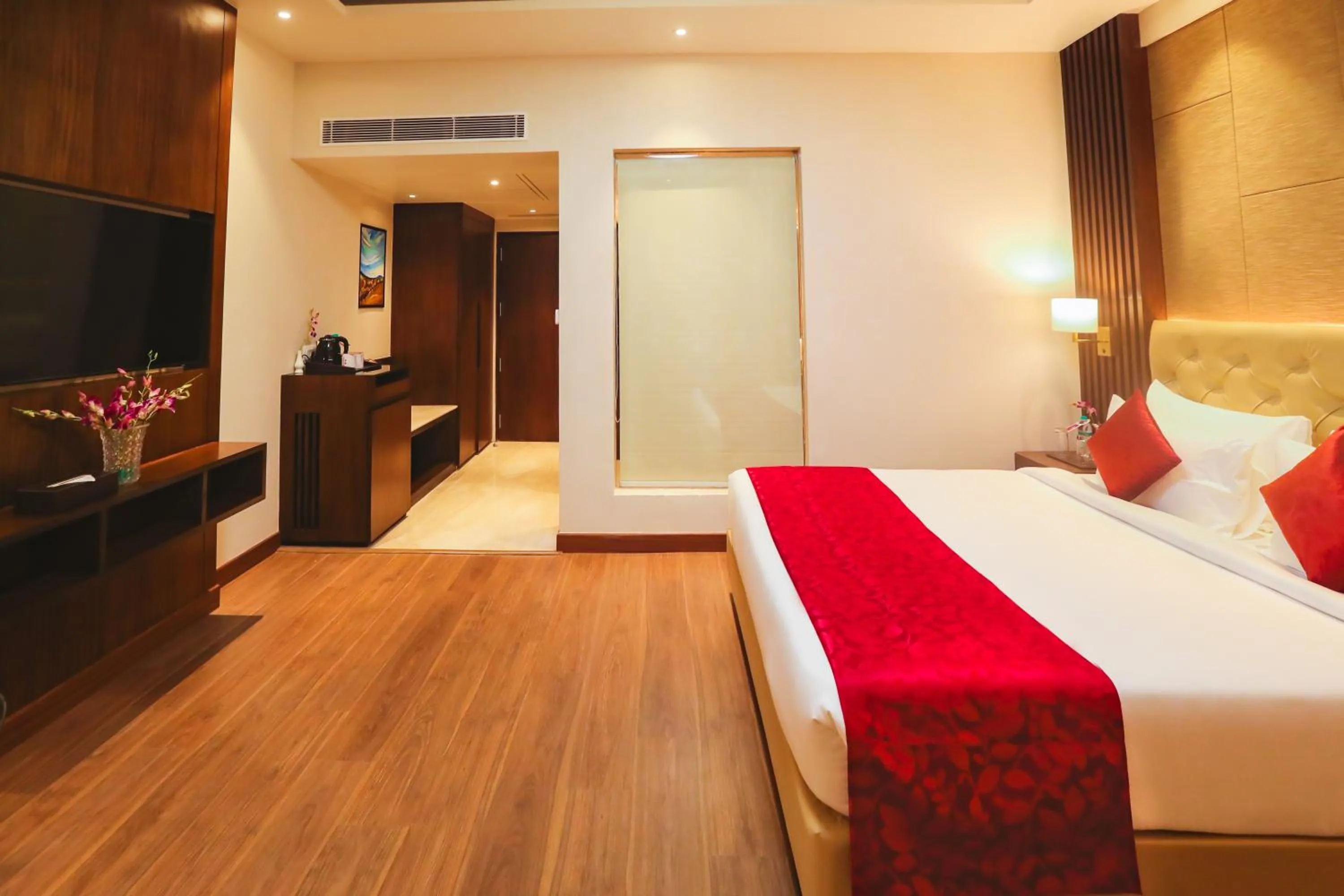 Bedroom, Bed in Regenta Place Jhansi by Royal Orchid Hotels Limited