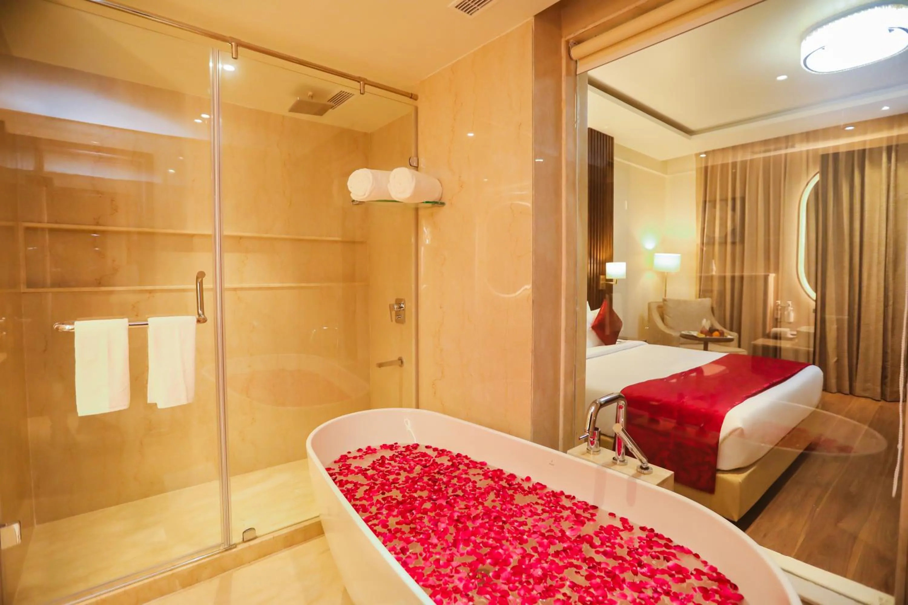 Bathroom, Bed in Regenta Place Jhansi by Royal Orchid Hotels Limited