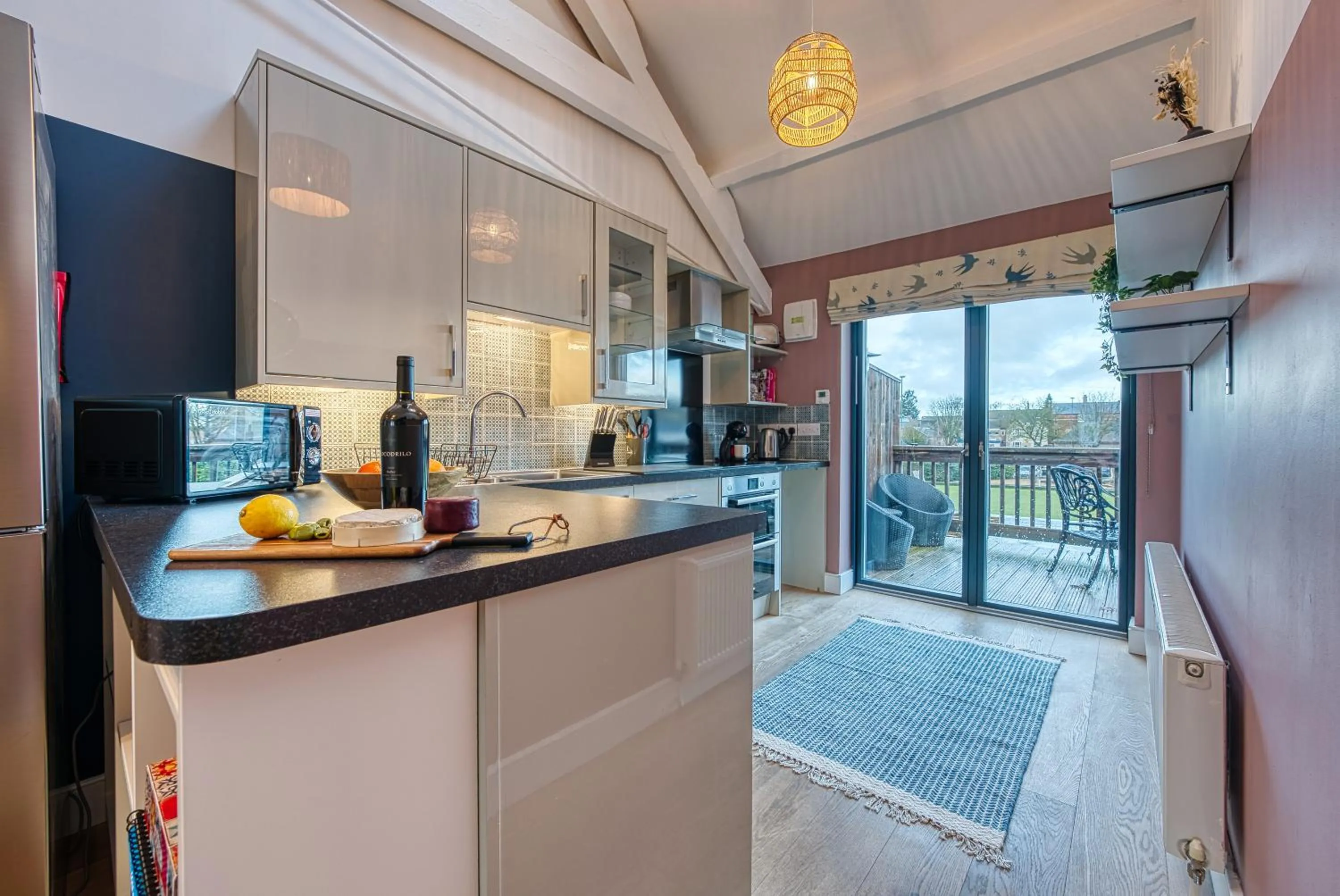 Kitchen or kitchenette in Ashcroft Loft by Home Stays Management - Stunning 3 Bedroom, 2 bathrooms, Charming central apartment featuring a balcony
