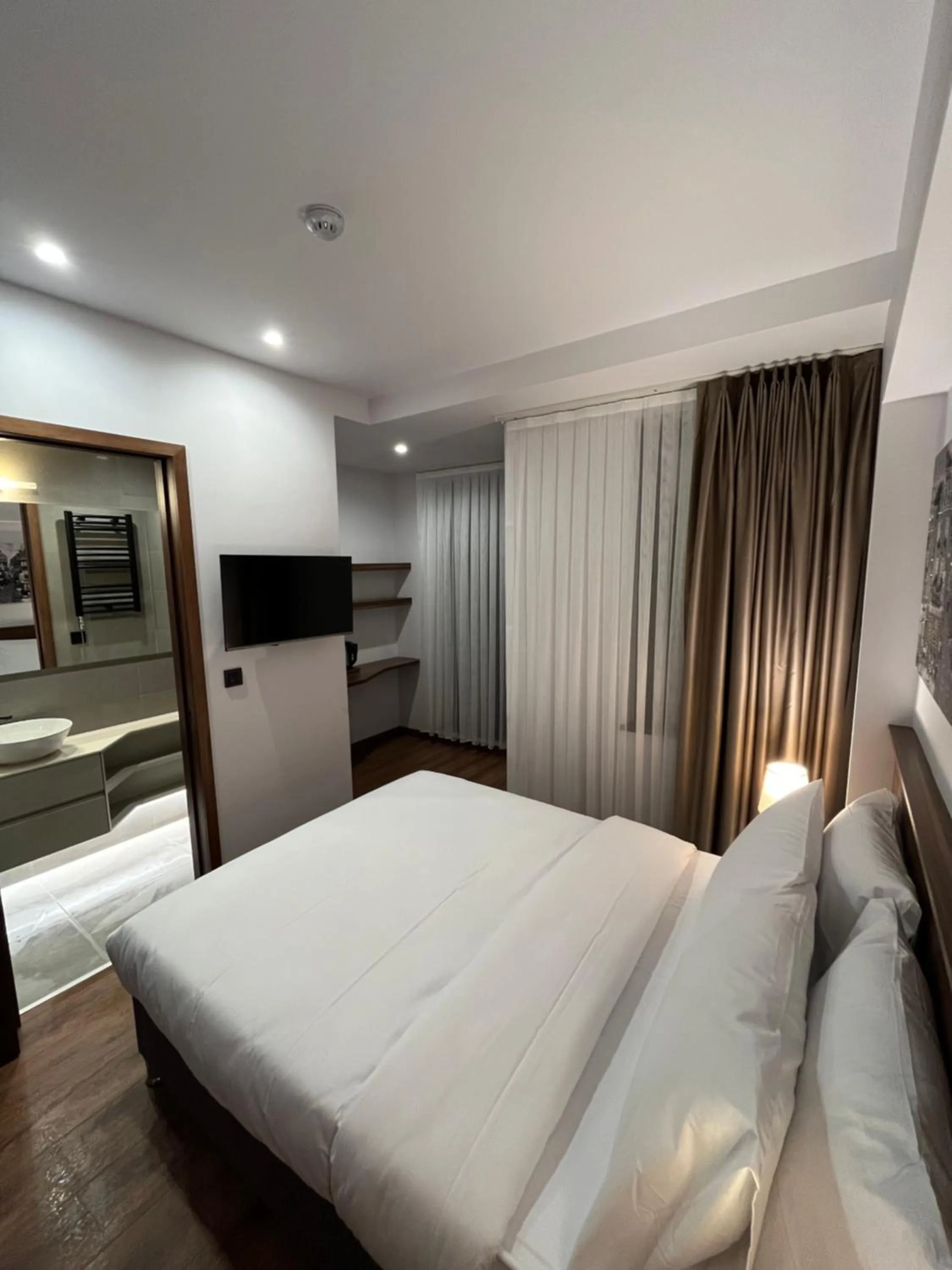 Communal lounge/ TV room, Bed in PALMERA HAGIA SOPHIA Hotel