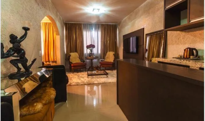 Communal lounge/ TV room in HOTEL PIACENTINI
