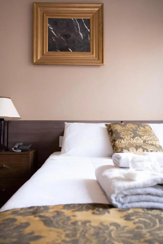 Bed in HOTEL PIACENTINI