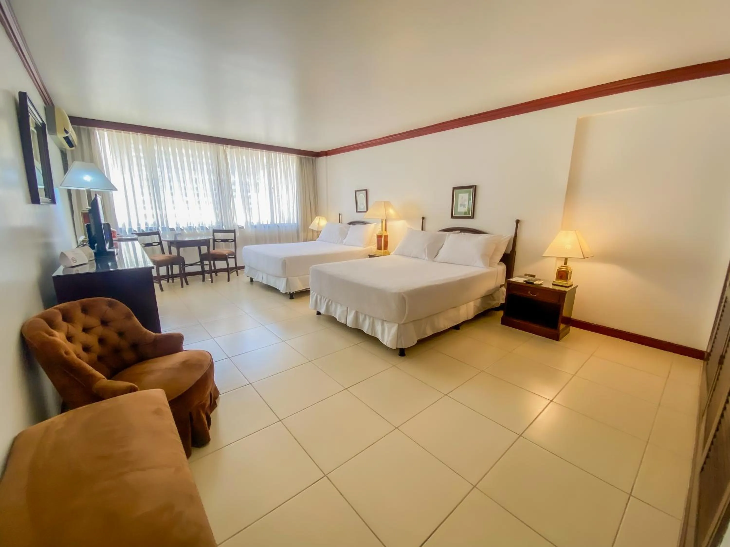 Decorative detail, Bed in Nobile Suites Excelsior Asuncion