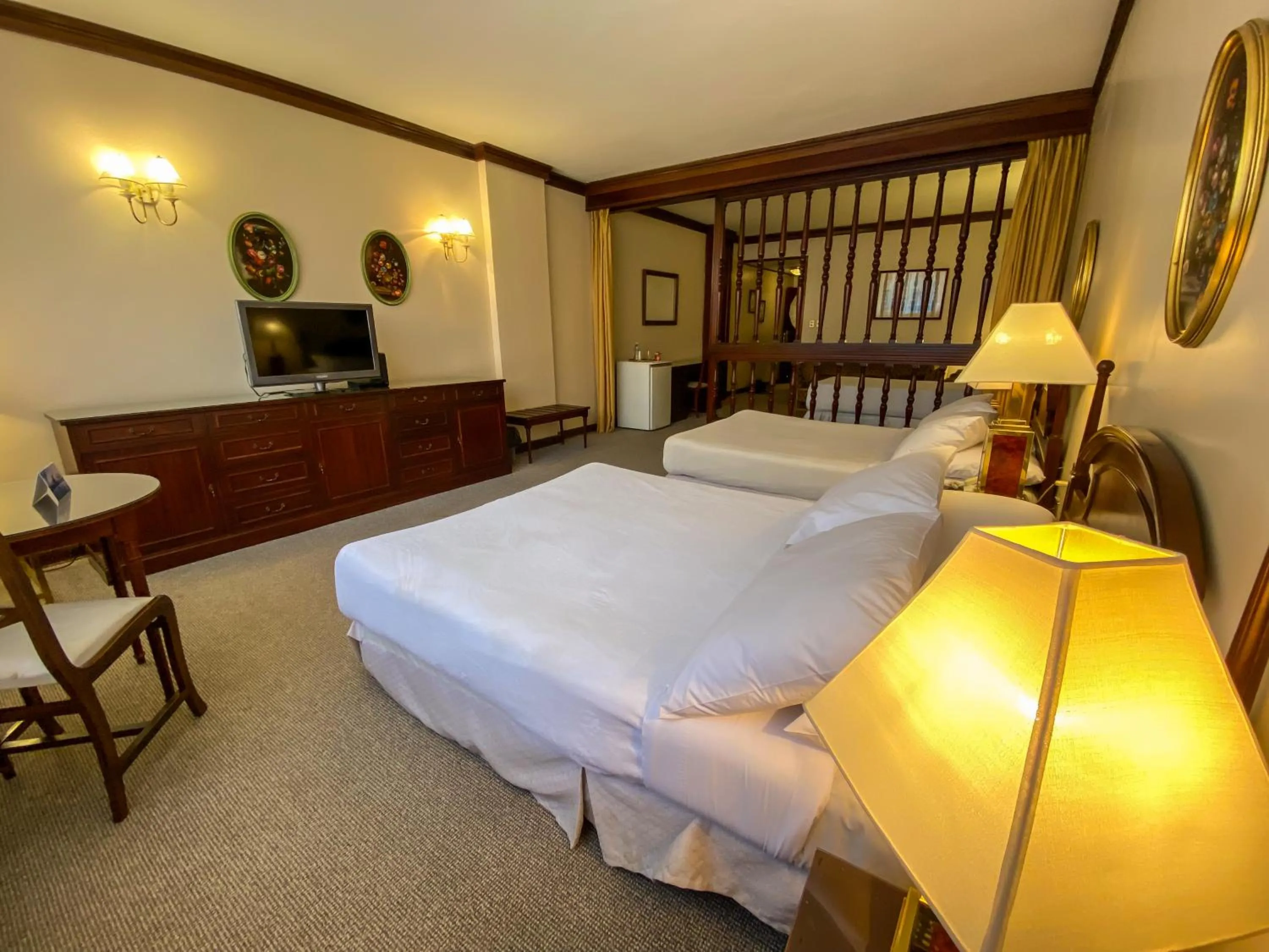 Bed in Nobile Suites Excelsior Asuncion