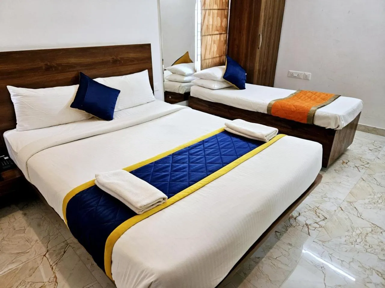 Bed in Keerthis Royal Suites Hotels in Bangalore Airport