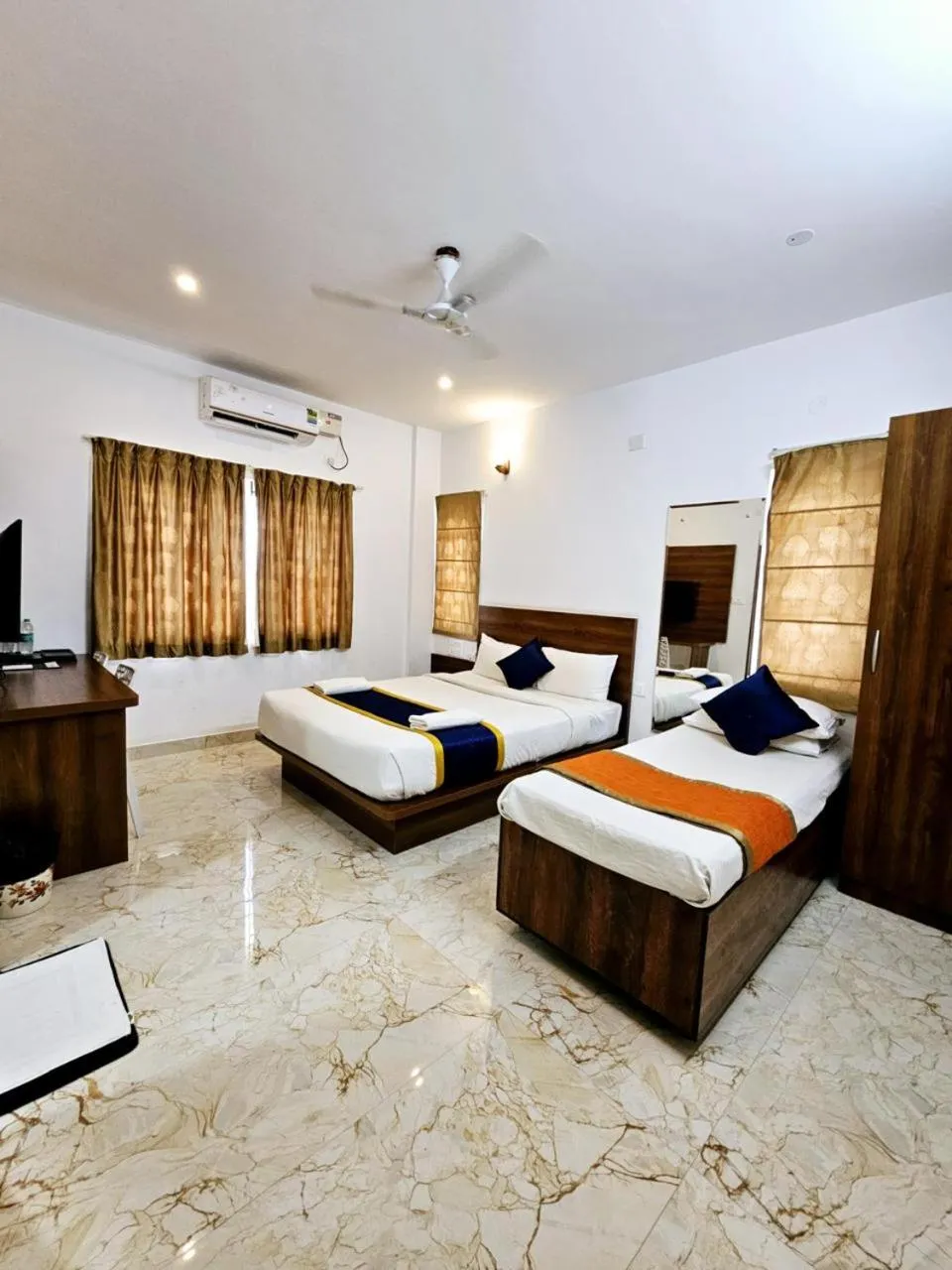 Bed in Keerthis Royal Suites Hotels in Bangalore Airport