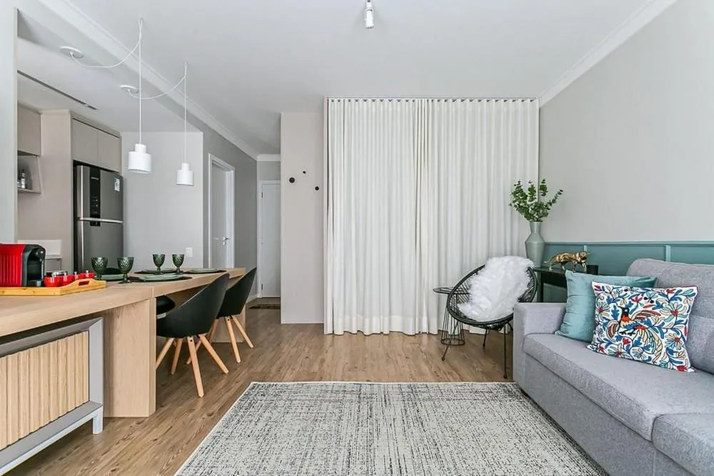 Living room in K-Platz 406 - Studio Elegante e Moderno na Melhor Localização do Continente