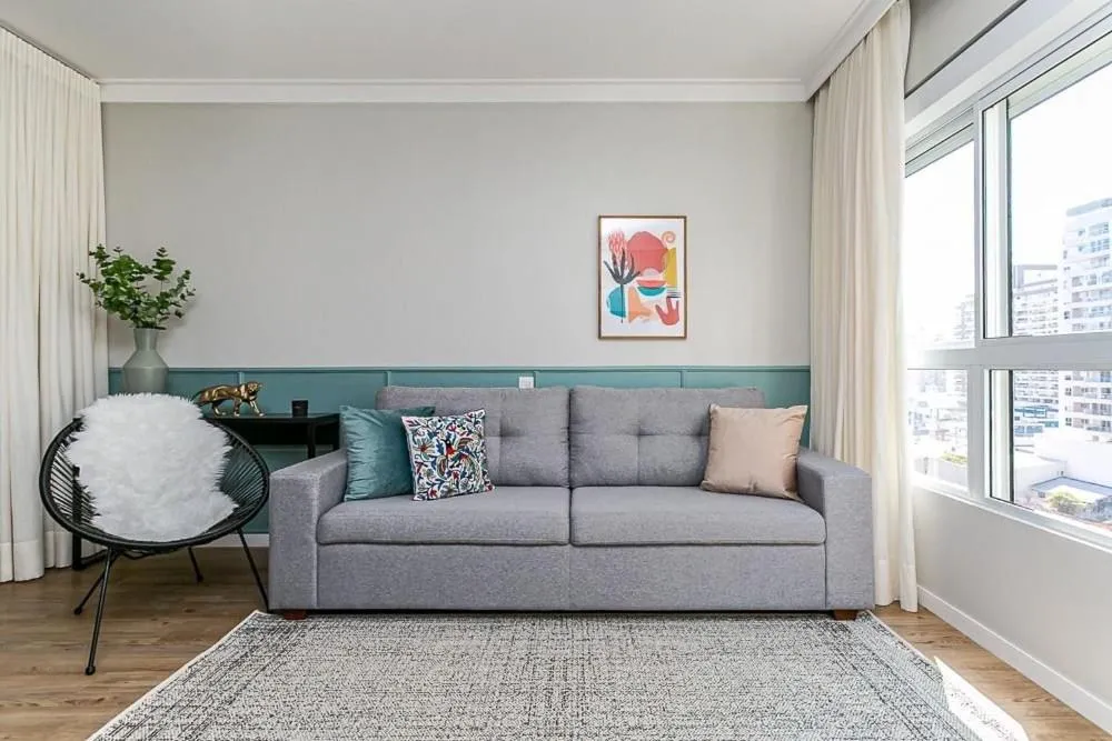 Living room in K-Platz 406 - Studio Elegante e Moderno na Melhor Localização do Continente
