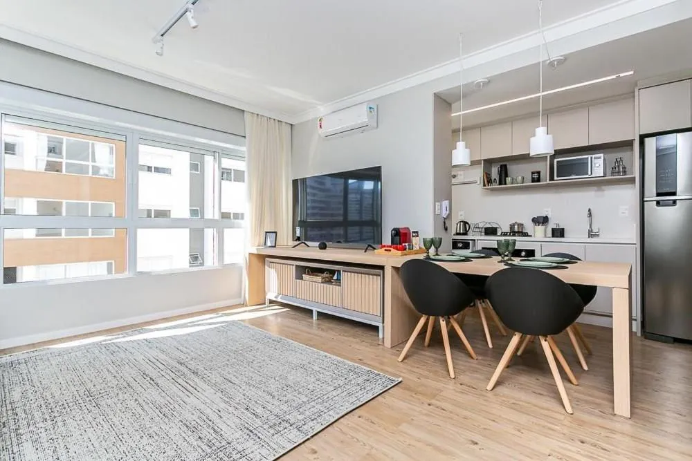 Living room in K-Platz 406 - Studio Elegante e Moderno na Melhor Localização do Continente