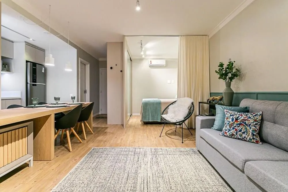Living room in K-Platz 406 - Studio Elegante e Moderno na Melhor Localização do Continente